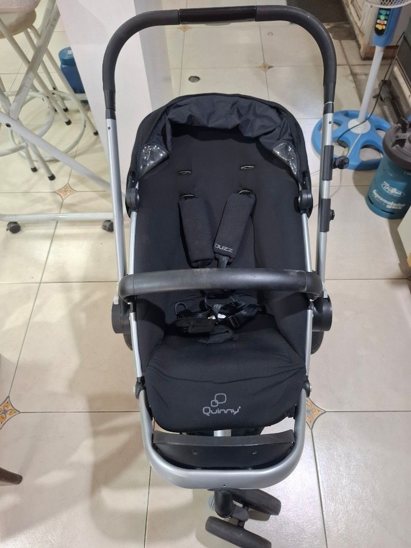 Quinny Buzz Stroller (Category: Strollers) located in Quezon City. Submitted by frustratedentrep (Listing ID 1422330570, Image 1). Description: - Quinny Buzz stroller - Sleek black design with silver frame - Comfortable seat with safety straps - Convenient storage basket - Easy-to-maneuver three-wheel design - Quinny logo visible Price: 3,000php Pickup: Kapitolyo, Pasig (shouldered by the buyer) Message/PM me if youre interested. MOP: Gcash/BDO R