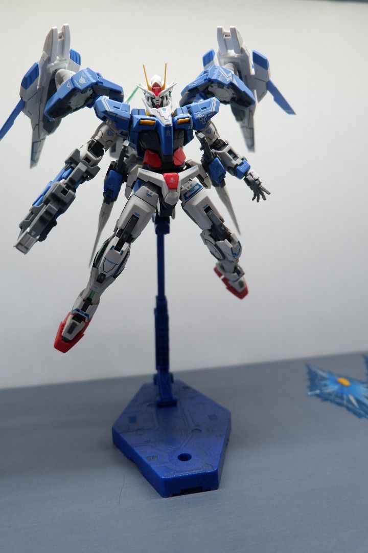 RG 1/144 00 Raiser Bandai (Category: Gundam & Model Kits) located in Manila. Submitted by newdragon.aecb7e (Listing ID 1422370317, Image 1). Description: -Top coated with Matte Krylon -Water slide decals applied. -Stand included. -All accessories, GN Shield and weapon effect parts included. -No box, with manual.