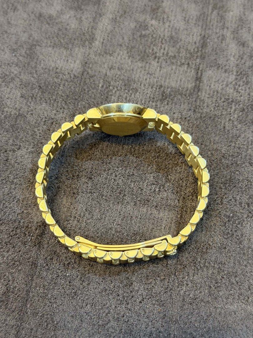 Rolex Cellini 18K Gold Diamond Watch (Category: Women's Watches) located in Imus. Submitted by juantosell777 (Listing ID 1422156489, Image 3). Description: I have an authentic Rolex Cellini watch. Features a gold dial with diamond accents around the bezel. The watch is made of 18K gold and weighs 66.57 grams. The model number is 2253, and the serial number is NG09375. The clasp is marked with "Rolex Geneve 750 Swiss Made 18K". Selling price: P815
