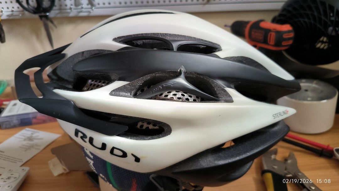 Rudy Project Sterling+ Cycling Helmet (Category: Bicycles) located in Quezon City. Submitted by picshot (Listing ID 1422290895, Image 2). Description: - Rudy Project Sterling+ cycling helmet - Size: L - Color: White and Black - Features: - Adjustable straps - Vents for airflow - Visor for sun protection - Visible interior padding - CE safety certified RFS: Size is a bit big for my head. hardly use it. Replaced some plastic part with 3D printed pa