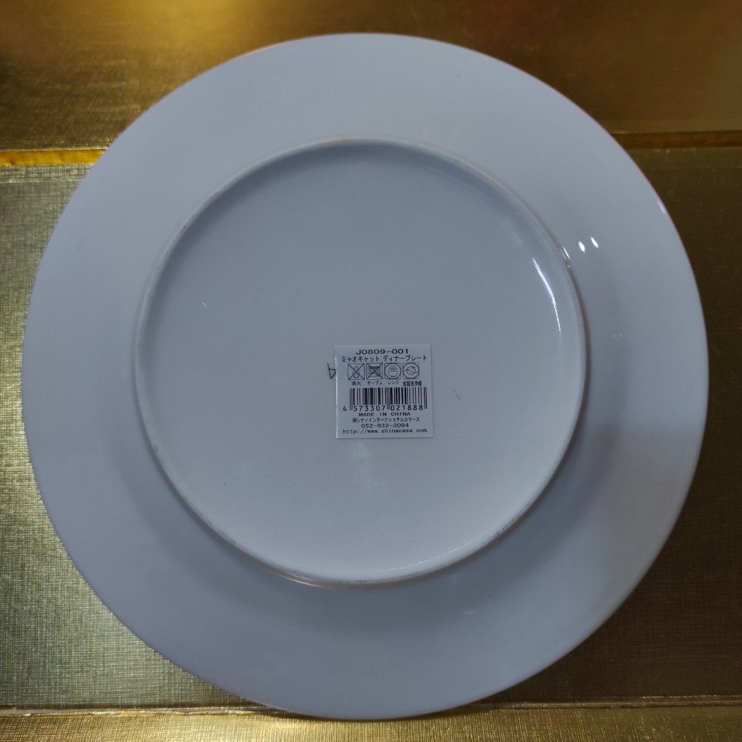 Shina Casa Cat Ceramic Dinner Plate (Category: Dinnerware & Cutlery) located in Cainta. Submitted by fukunekojapansurplus (Listing ID 1422332669, Image 3). Description: 130 pesos no issue Adorable dinner plate features a playful cat design with various cat-related illustrations. It is made in China and is microwave and dishwasher safe. The plate has a diameter of approximately 20cm. The back of the plate has the brand and model information. Perfe