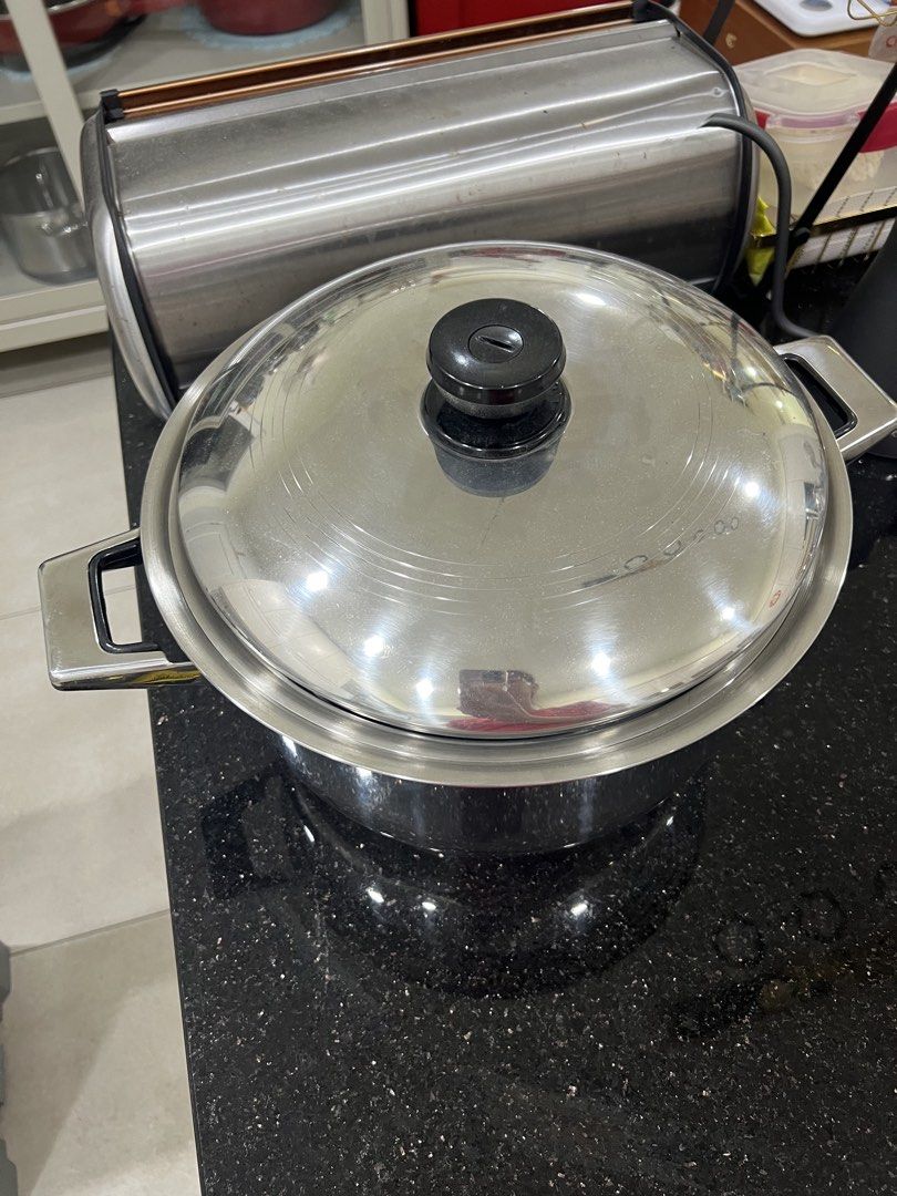 Stainless Steel Pot with steam tray. (Category: Cookware & Accessories) located in Shah Alam. Submitted by jasminetee33 (Listing ID 1422306865, Image 2). Description: Brand: Mega-10 USA stainless steel Very thick and durable material. Well kept, brand new. Never use. Suitable for big family. User friendly..