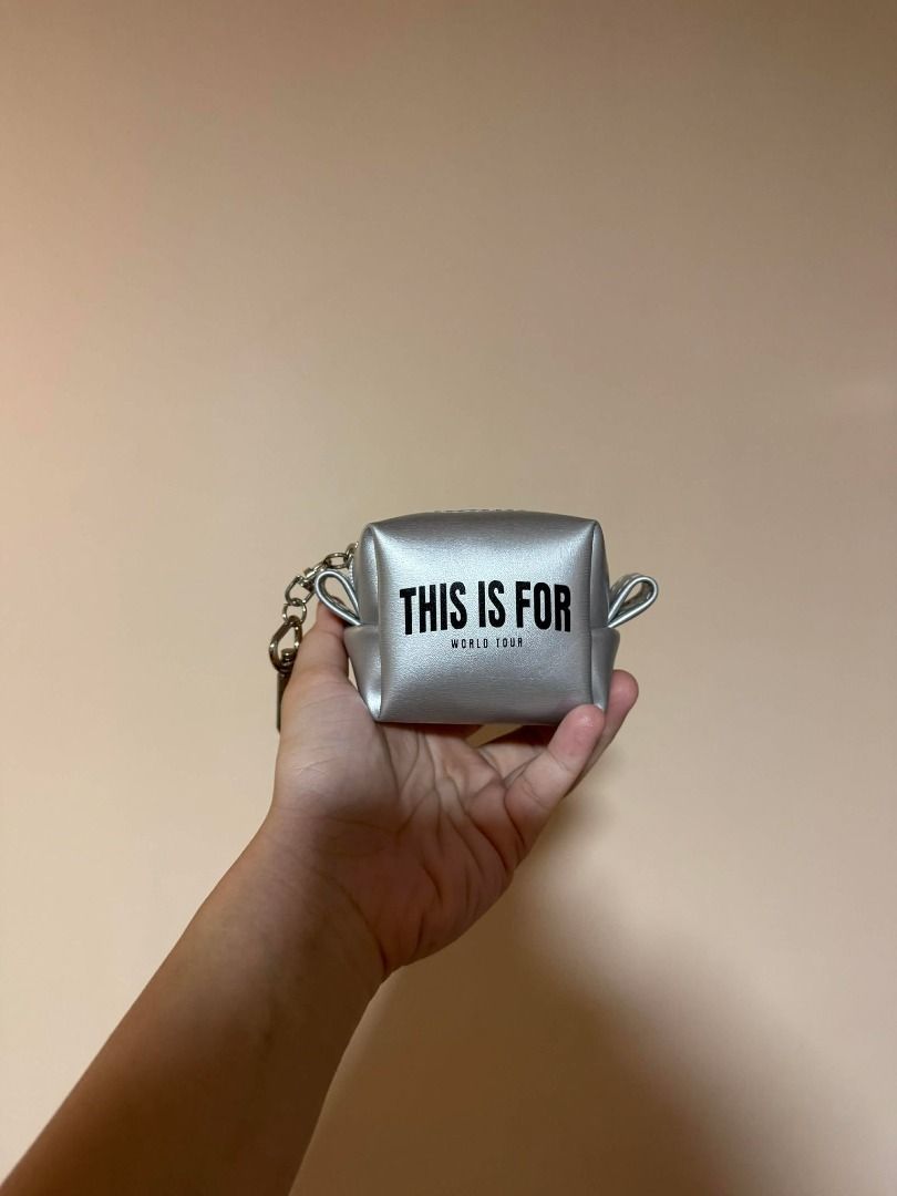 TWICE This Is For World Tour Keychain Pouch (Category: Purses & Pouches) located in Quezon City. Submitted by cgemb024 (Listing ID 1422240491, Image 2). Description: - Official This is For Concert Merch - Includes chain and clasp - Designed for small items - See Tag inside, proof its official RFS: Need Funds.