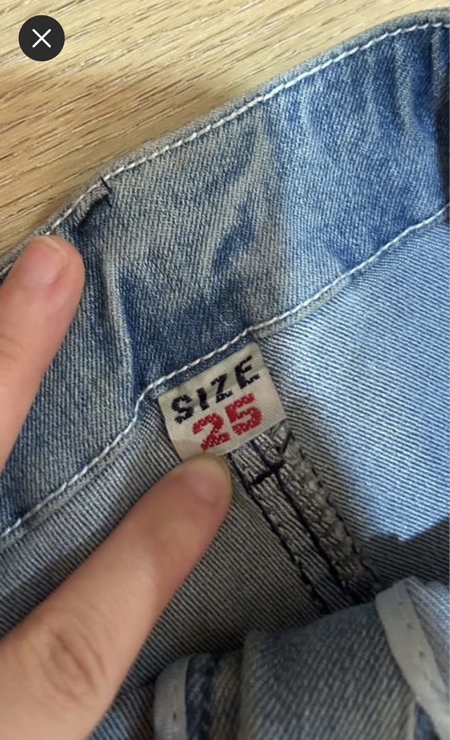 Vintage Flare Jeans | Denim (Category: Jeans) located in Binan City. Submitted by supanovaaa (Listing ID 1422130781, Image 2). Description: - Light wash, Denim flare jeans - Size 25, Length: 41" - Features a button and zipper closure - High waist with classic flare leg - Perfect for a vintage-inspired look.