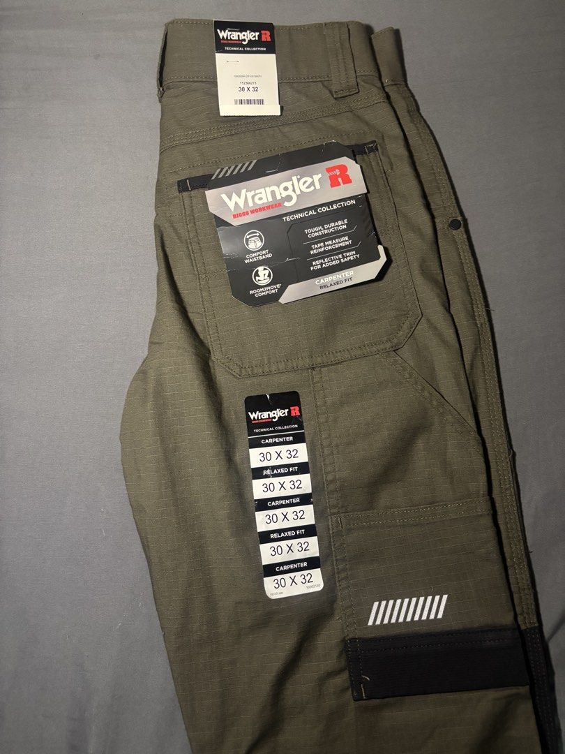 Wrangler Carpenter Technical Collection Pants 30x32 (Category: Jeans) located in Manila. Submitted by scshellfinds (Listing ID 1422238017, Image 2). Description: Wrangler Carpenter Technical Collection pants in size 30x32. Features a relaxed fit and durable construction. Includes multiple pockets and reflective details. The pants are olive green with black accents. The tags indicate the pants are part of the Technical Collection..