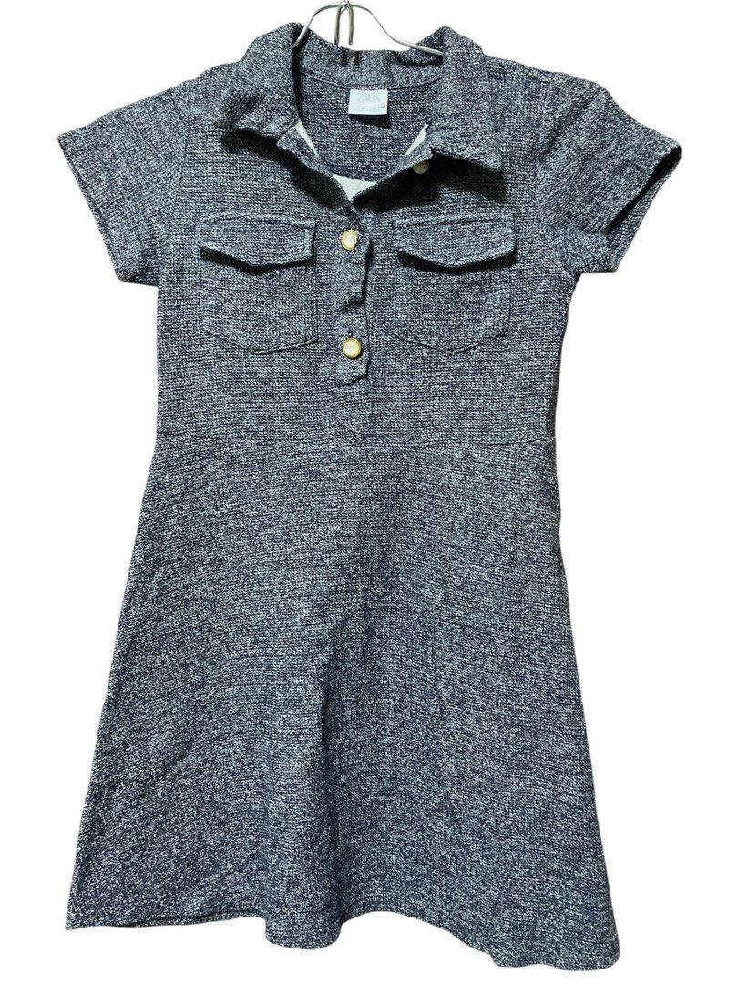 ZARA Gray Collared Dress with Pockets (Category: Babies & Kids Fashion) located in Quezon City. Submitted by mcva2 (Listing ID 1422320840, Image 1). Description: - Gray dress - Collared neckline - Short sleeves - Button-down closure - Two front pockets - Textured fabric - Slightly flared skirt - Comfortable for everyday wear.