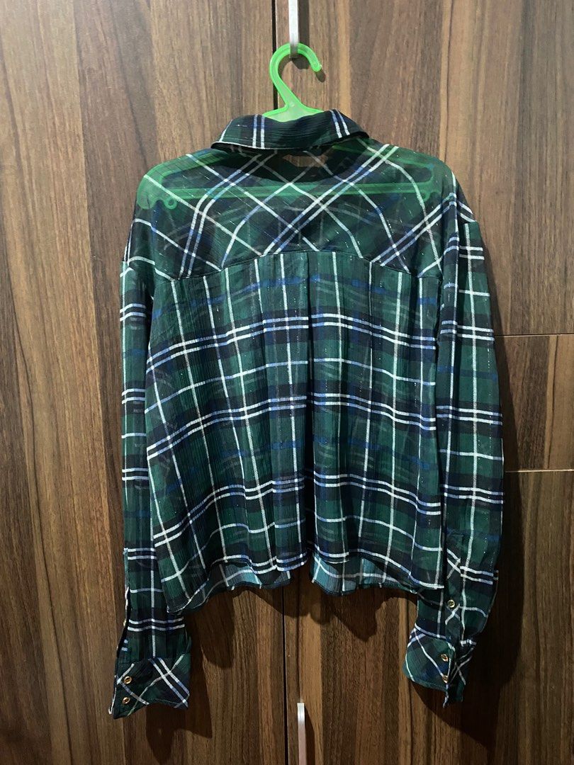 Zara Plaid Shirt - Size L (Category: Shirts) located in Antipolo. Submitted by MindMunch (Listing ID 1422337409, Image 3). Description: - Zara plaid shirt (checkered, flannel) - Size: L - Colors: Green, black, white - Made in Morocco - Features: Collared neckline, button-down closure, long sleeves with buttoned cuffs, two chest pockets.
