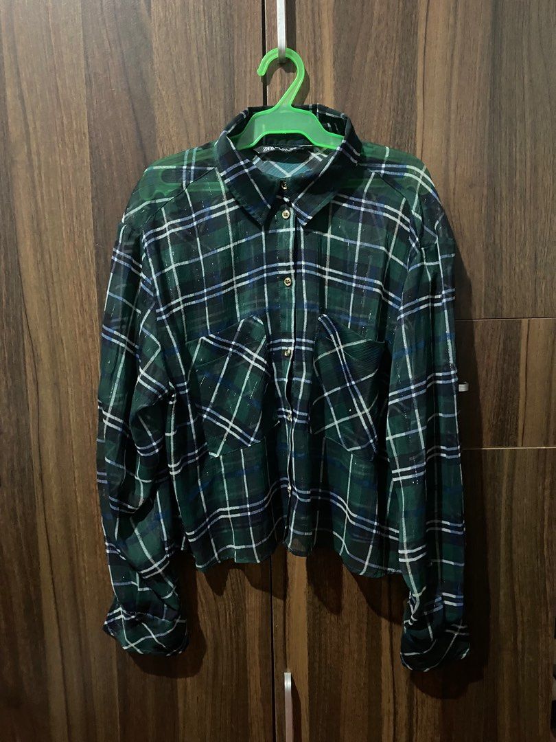 Zara Plaid Shirt - Size L (Category: Shirts) located in Antipolo. Submitted by MindMunch (Listing ID 1422337409, Image 1). Description: - Zara plaid shirt (checkered, flannel) - Size: L - Colors: Green, black, white - Made in Morocco - Features: Collared neckline, button-down closure, long sleeves with buttoned cuffs, two chest pockets.
