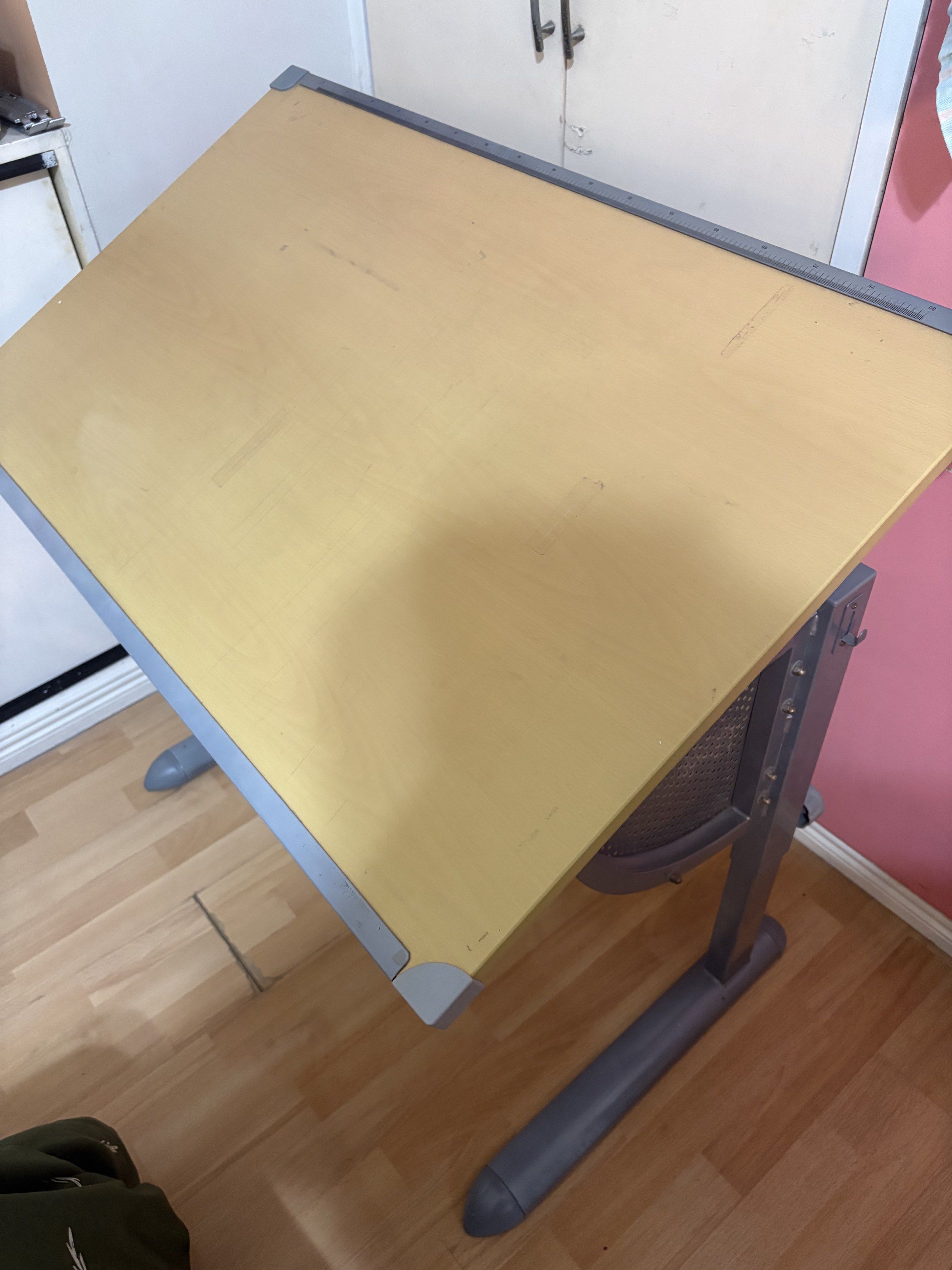 Adjustable Drafting Table (Category: Tables & Sets) located in Paranaque City. Submitted by heyitsmeb (Listing ID 1419336282, Image 2). Description: For sale - Drafting Table Size: 0.96 m L x 0.60 m W See photos for condition; pwede takpan yung buong table surface ng cartolina para matakpan yung mga hiwa Okay pa yung pagka-recline niya Php 4,500 only! (Brand new costs Php 16k almost) Loc: Sucat, Paranaque Shipping c/o buyer.