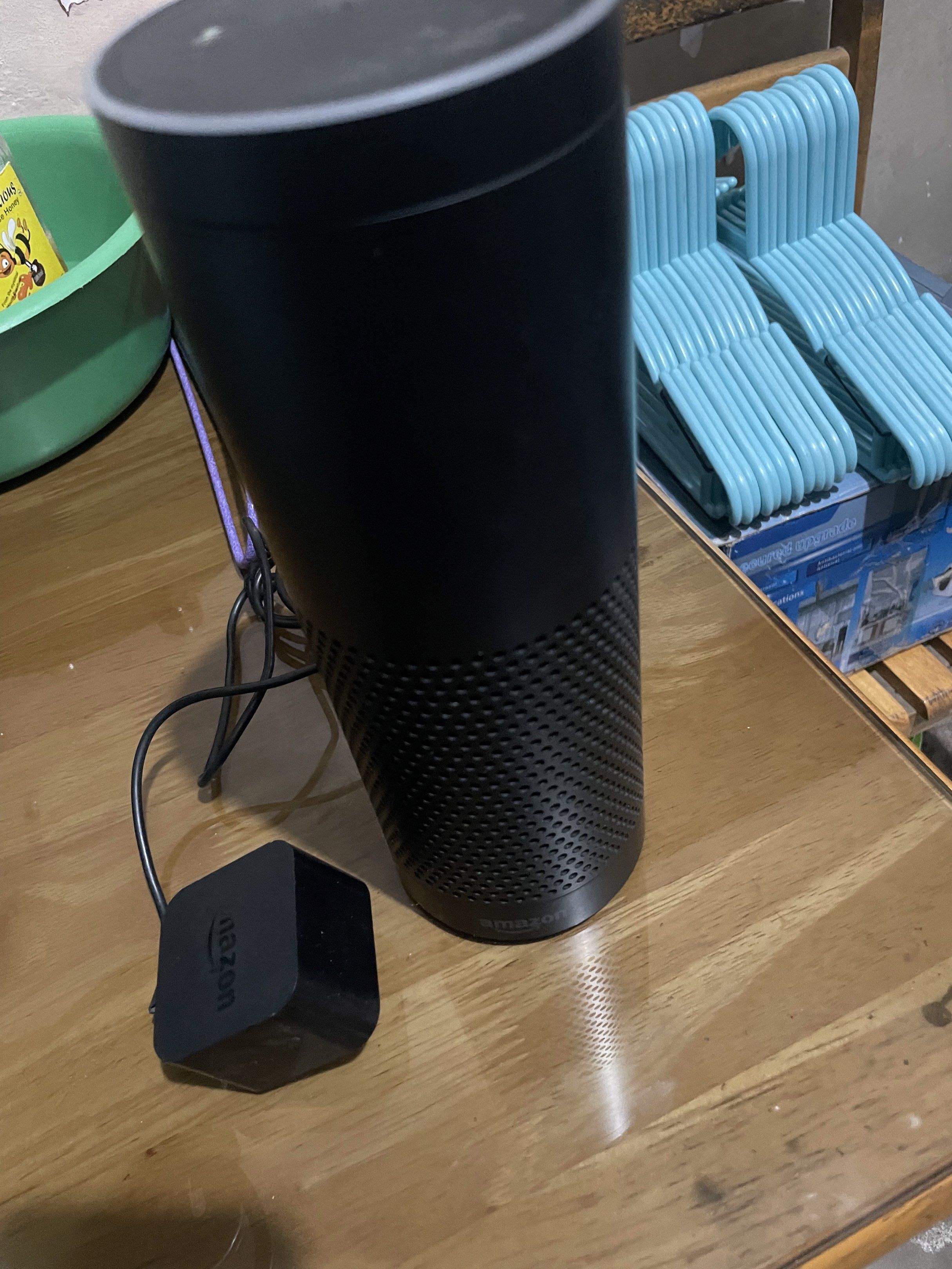Amazon Echo (Category: Soundbars, Speakers & Amplifiers) located in Manila. Submitted by cosmiccloud-adf7 (Listing ID 1419256186, Image 1). Description: - Amazon Echo smart speaker - Color: Black - Includes power adapter - Features top buttons and microphone icon - Cylindrical design - Fabric-like texture on the bottom half.