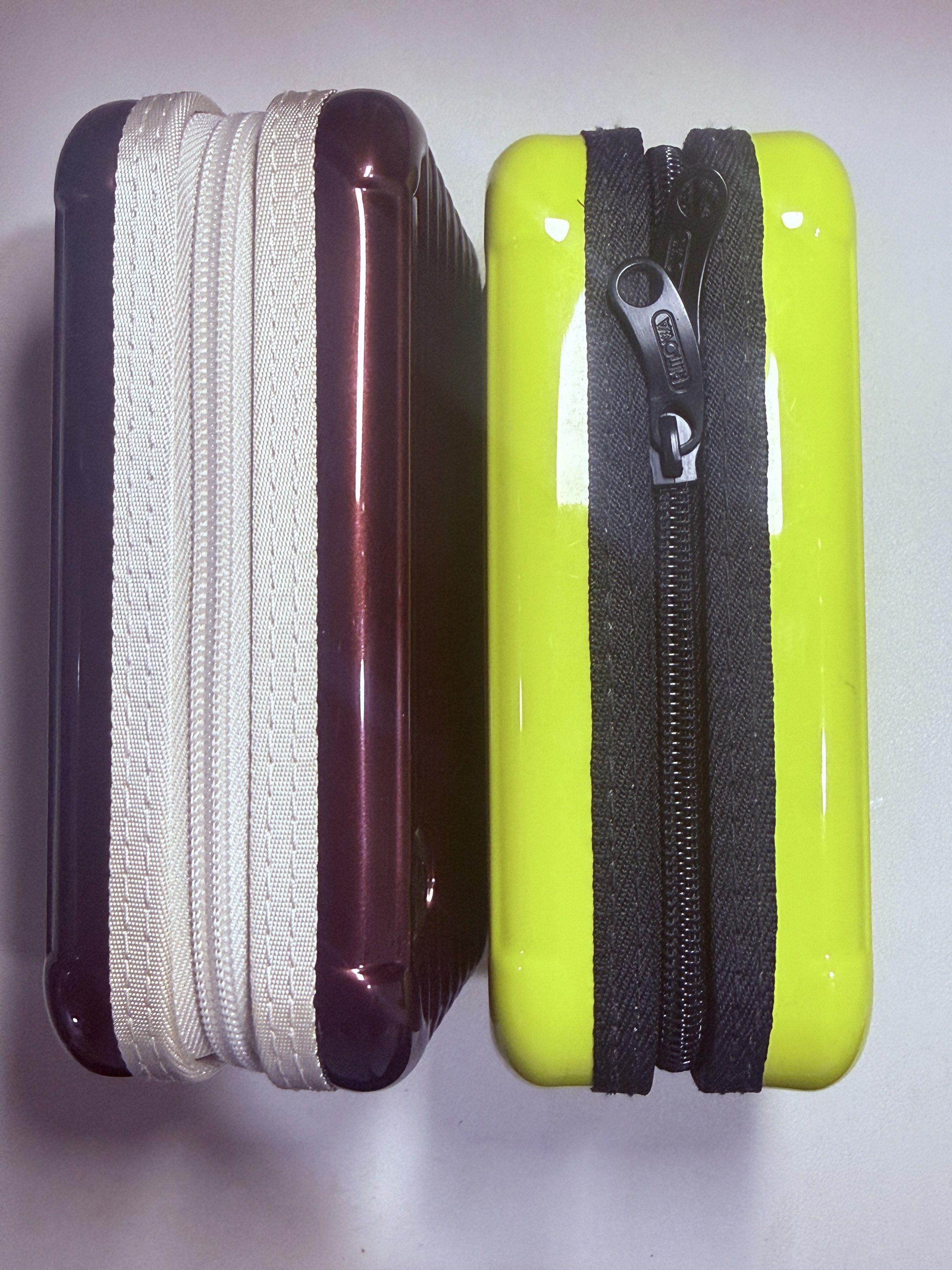 Authentic Rimowa Charger / Cosmetic Case (Category: Luxury Bags & Wallets) located in San Juan City. Submitted by shoprinat (Listing ID 1419361394, Image 2). Description: - Available in yellow and burgundy - Features a ribbed design - Secure zipper closure - Has multiple compartments - Perfect for travel or everyday use - Keeps your essentials organized.