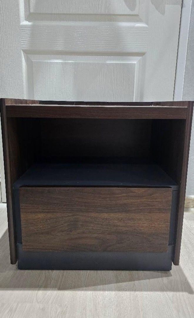 Bedside Table (Category: Tables & Sets) located in Singapore. Submitted by icequeennn (Listing ID 1419257864, Image 1). Description: Letting go of this beautiful walnut side table from FortyTwo 🤎 Purchased in July 2025, still in like-new condition. Original price: $89.90 (refer to next photo) Letting go to clear space. ✔️ Comes with 3 years warranty 📏 Dimensions: • Width: 50.5 cm • Depth: 40 cm • Height: 51.5 cm.