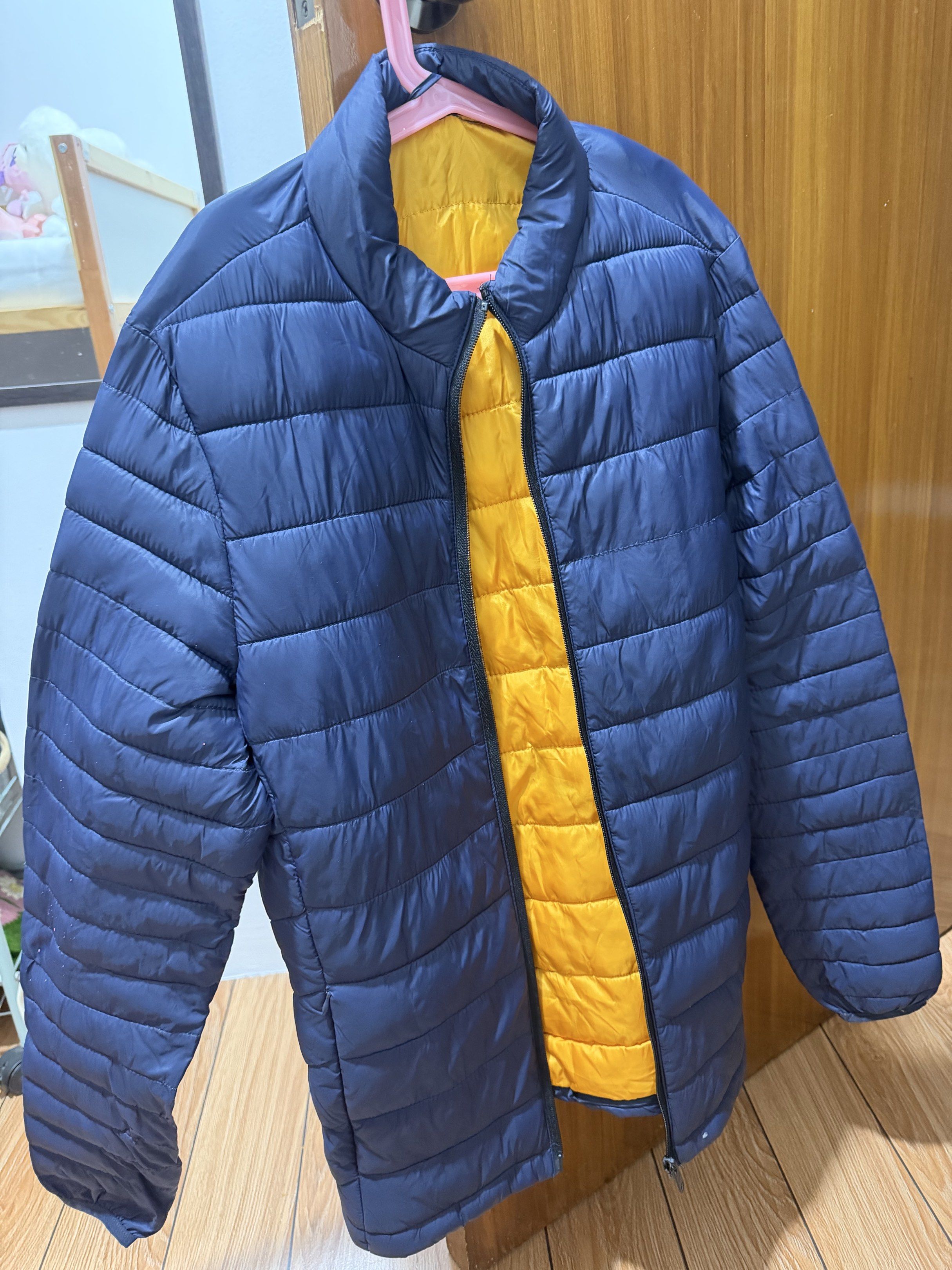 Bershka Menswear Reversible Jacket (Category: Coats, Jackets and Outerwear) located in Manila. Submitted by eah0416 (Listing ID 1419300822, Image 2). Description: - Bershka Men's Reversible Jacket - Size: S - Colors: Navy blue (exterior) / Yellow (interior) - Features: Zip closure, inside pocket.