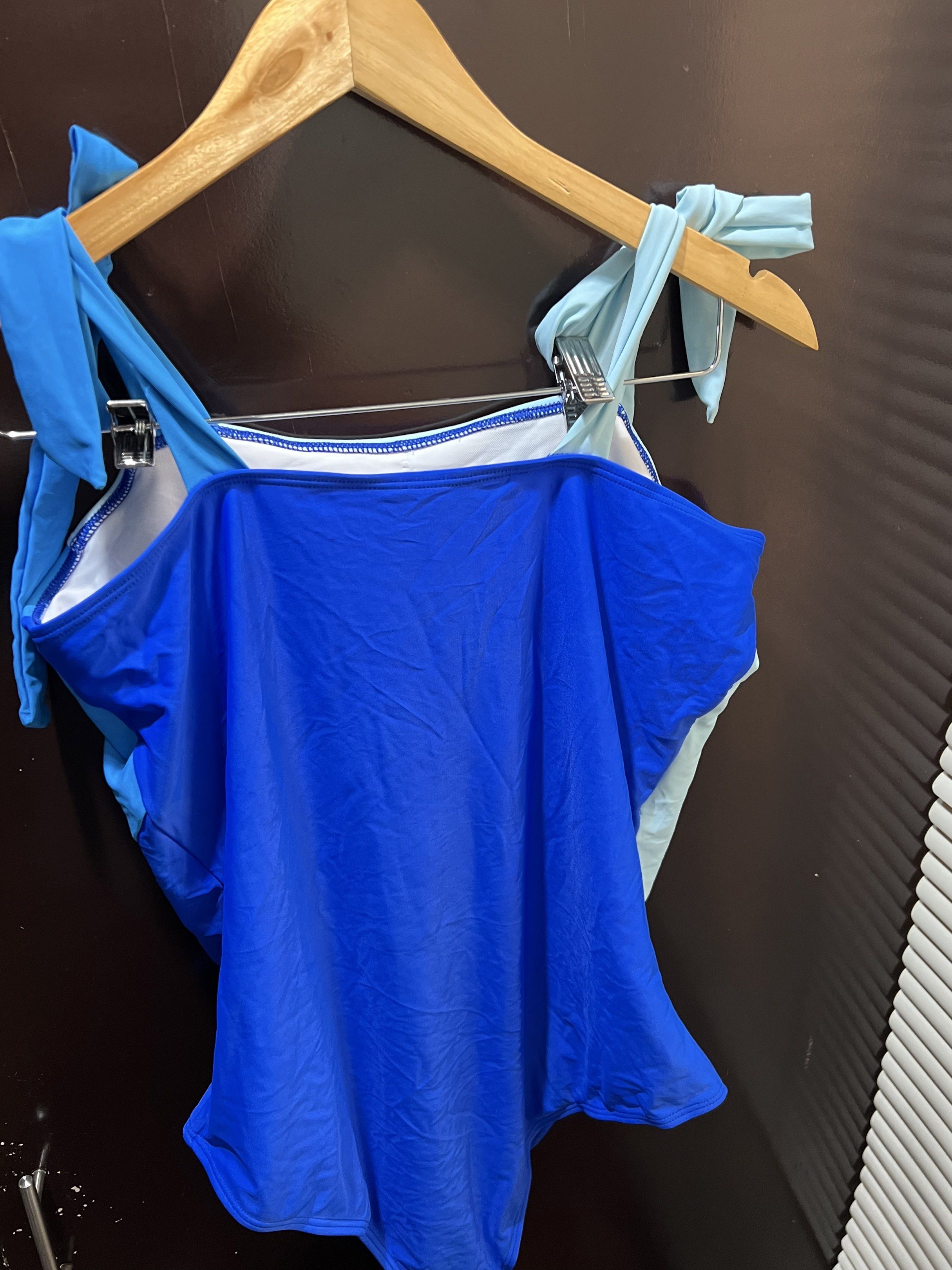Blue Colorblock Swimsuit with Tie Straps (Category: Bikinis & Swimsuits) located in Paranaque City. Submitted by lhenlhen0021 (Listing ID 1419294222, Image 3). Description: - Colorblock design in shades of blue - One-piece style - Features tie straps for an adjustable fit.