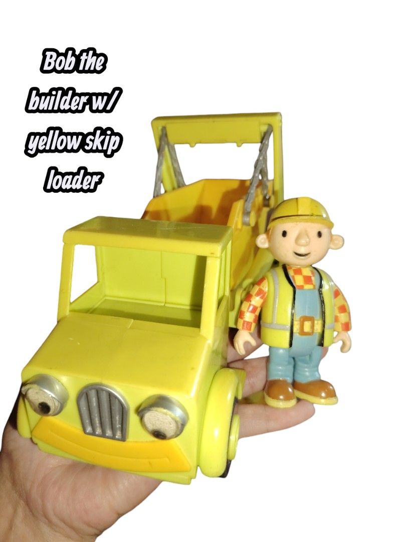Bob the Builder Toy with Yellow Skip Loader (Category: Kids Toys) located in Iligan City. Submitted by shehabdor98515 (Listing ID 1419270275, Image 1). Description: - Bob the Builder toy set - Includes a yellow skip loader - Features a Bob the Builder figure - Skip loader has detailed design - Bob the Builder figure wears a yellow vest and blue overalls - Ideal for kids who love Bob the Builder and construction toys.