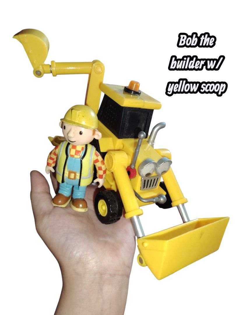 Bob the Builder Toy with Yellow Scoop (Category: Kids Toys) located in Iligan City. Submitted by shehabdor98515 (Listing ID 1419270426, Image 1). Description: - Bob the Builder toy - Features a yellow scoop - Includes a Bob the Builder figure - Yellow with black details - Construction vehicle design.