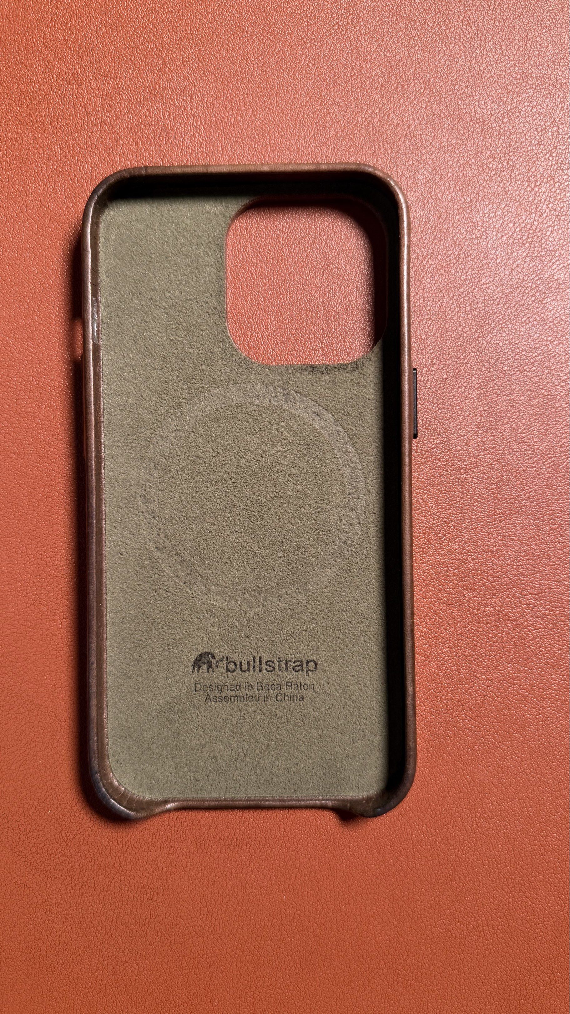 Bullstrap Maverick iPhone 13 Pro Case (Category: Cases & Sleeves) located in Quezon City. Submitted by allthingsdapper (Listing ID 1419336946, Image 2). Description: The Bullstrap Maverick iPhone 13 Pro Case is a premium, handcrafted full-grain leather case designed for a precise, slim fit. It features MagSafe compatibility, allowing for seamless charging and accessory attachment. The Maverick color offers a classic green color, designed to devel