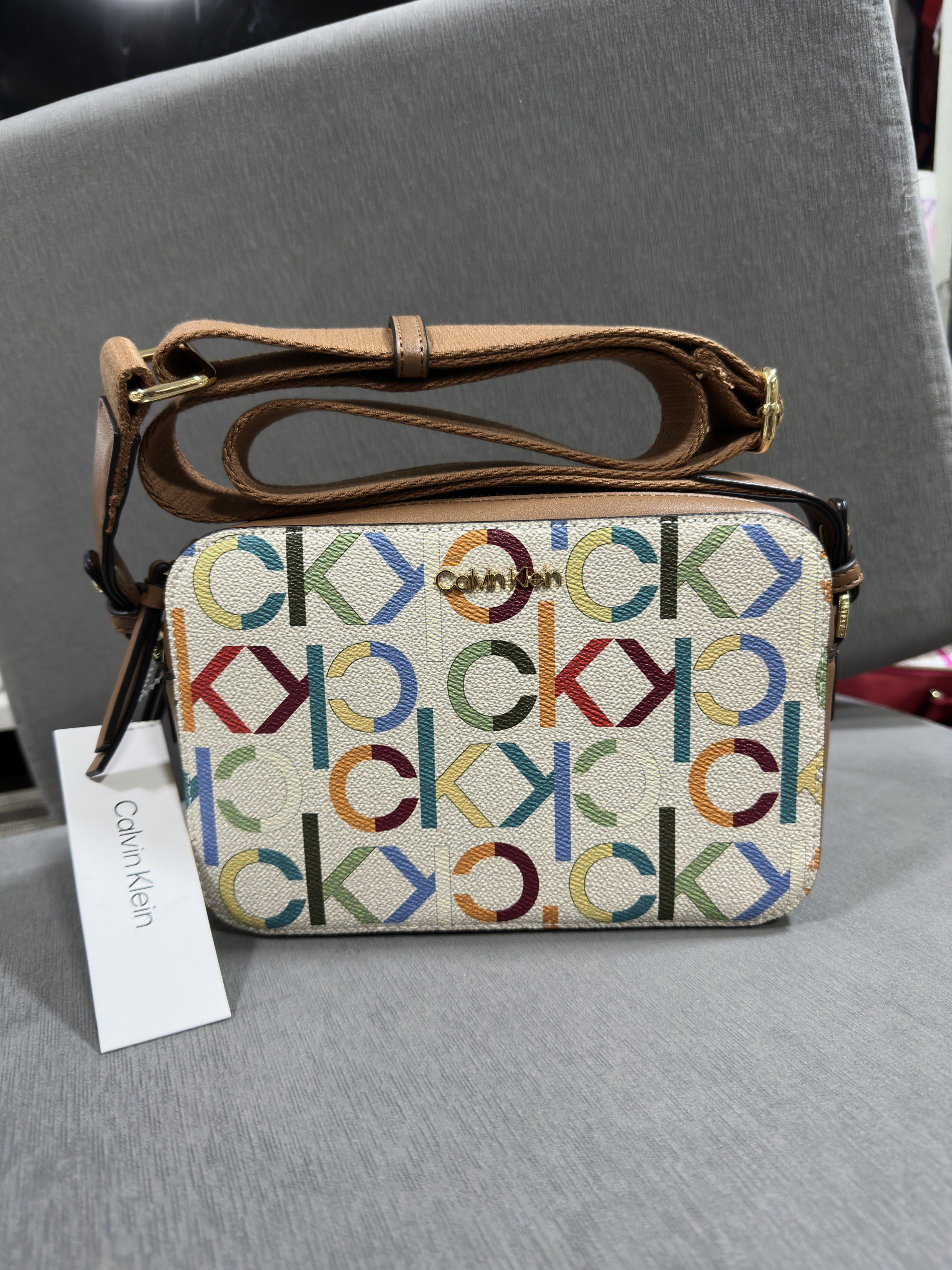 Calvin Klein Multicolor Crossbody Bag (Category: Luxury Bags & Wallets) located in Rizal. Submitted by GirlDeclutter (Listing ID 1419321824, Image 1). Description: Calvin Klein Multicolor Crossbody Bag 👜 Only ₱5,900 Originally bought in the US for $149 ✨.
