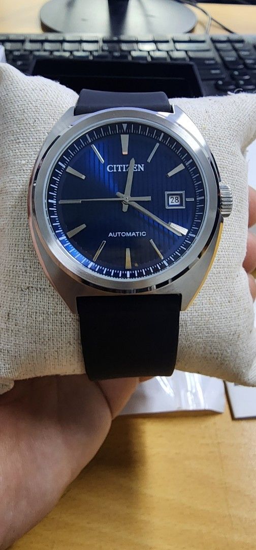 Citizen NJ0100-71L Automatic Watch with Blue Dial (Category: Men's Watches) located in Taguig. Submitted by masterbert (Listing ID 1419234285, Image 1). Description: FOR SALE/TRADE - Citizen automatic watch - Striking blue dial - Stainless steel case - Free Black rubber strap - Includes original box, original bracelet with extra links, extra strap, and paperwork - Date display at 3 o'clock.