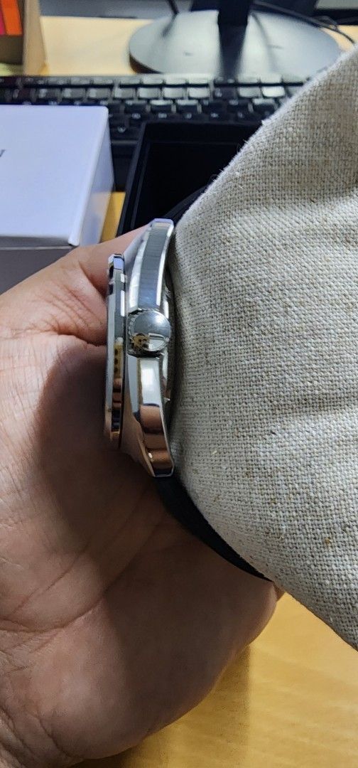 Citizen NJ0100-71L Automatic Watch with Blue Dial (Category: Men's Watches) located in Taguig. Submitted by masterbert (Listing ID 1419234285, Image 2). Description: FOR SALE/TRADE - Citizen automatic watch - Striking blue dial - Stainless steel case - Free Black rubber strap - Includes original box, original bracelet with extra links, extra strap, and paperwork - Date display at 3 o'clock.