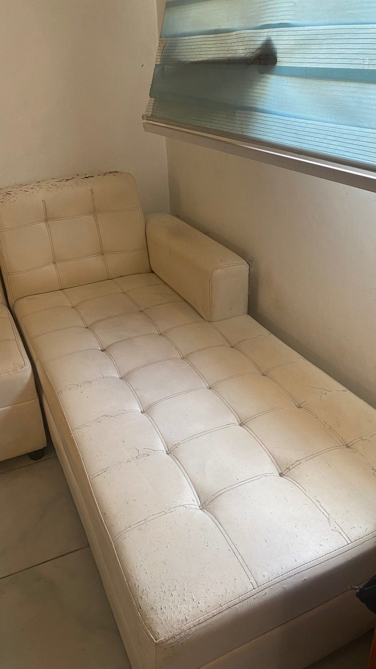 Cream-colored L-shaped Sofa Couch Leather (Category: Sofas) located in Quezon City. Submitted by ayreneeee (Listing ID 1419235474, Image 3). Description: - Cream-colored L-shaped sofa - Features a tufted design - Includes an attached chaise lounge - Made of faux leather material For upholstery & cleaning.