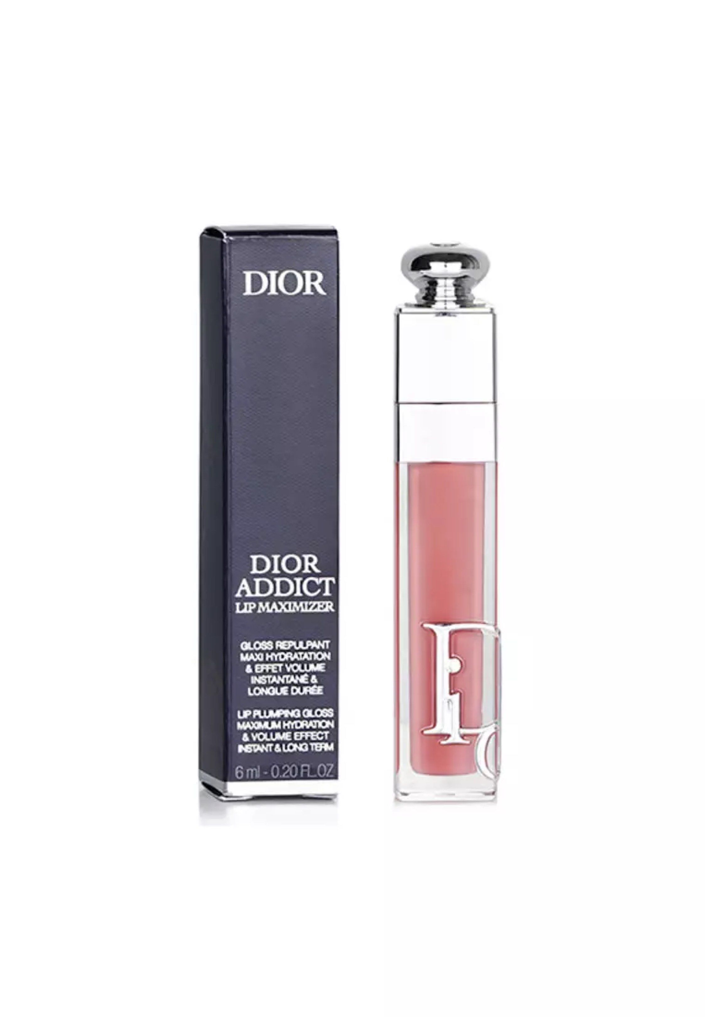 Dior Addict Lip Maximizer 038 (Category: Makeup) located in Manila. Submitted by cococlutters (Listing ID 1419234025, Image 1). Description: - Dior Addict Lip Maximizer in shade 038 - Provides hydration and volume - Clear tube with silver cap and Dior logo - Includes original box - Light pink color.