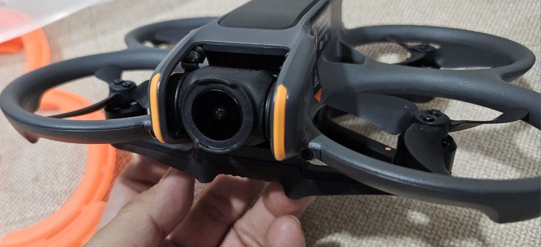 DJI Avata 2 FPV Drone FM Combo (Category: Drones) located in Quezon City. Submitted by simatar1 (Listing ID 1419258873, Image 3). Description: DJI Avata 2 FPV Drone FM Combo - Used only around 3 times times - No issues - Includes: (complete accessories) - Goggles 3 - Motion Controller 3 - 3 Batteries (5/3/2 cycles) - Charging Hub - Spare Propellers - Carrying Case - Prop guard protector (orange) - Hard Case - Ready to fly.