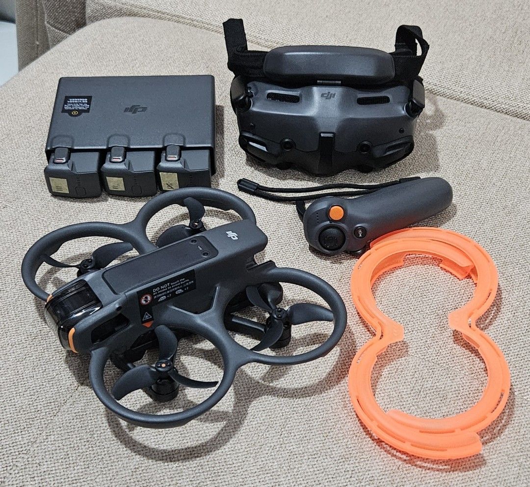 DJI Avata 2 FPV Drone FM Combo (Category: Drones) located in Quezon City. Submitted by simatar1 (Listing ID 1419258873, Image 1). Description: DJI Avata 2 FPV Drone FM Combo - Used only around 3 times times - No issues - Includes: (complete accessories) - Goggles 3 - Motion Controller 3 - 3 Batteries (5/3/2 cycles) - Charging Hub - Spare Propellers - Carrying Case - Prop guard protector (orange) - Hard Case - Ready to fly.