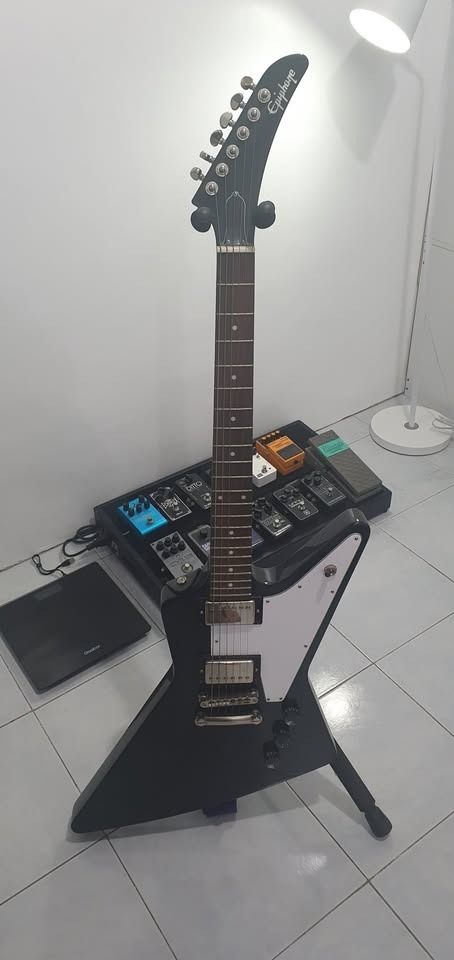 Epiphone Explorer Electric Guitar (Category: Musical Instruments) located in Quezon City. Submitted by sk8ter13 (Listing ID 1419297426, Image 1). Description: - Epiphone Explorer electric guitar - White pickguard - Dual humbucker pickups - Black control knobs Mode of Payment: Union Bank - GCASH No Trades - For Sale only.