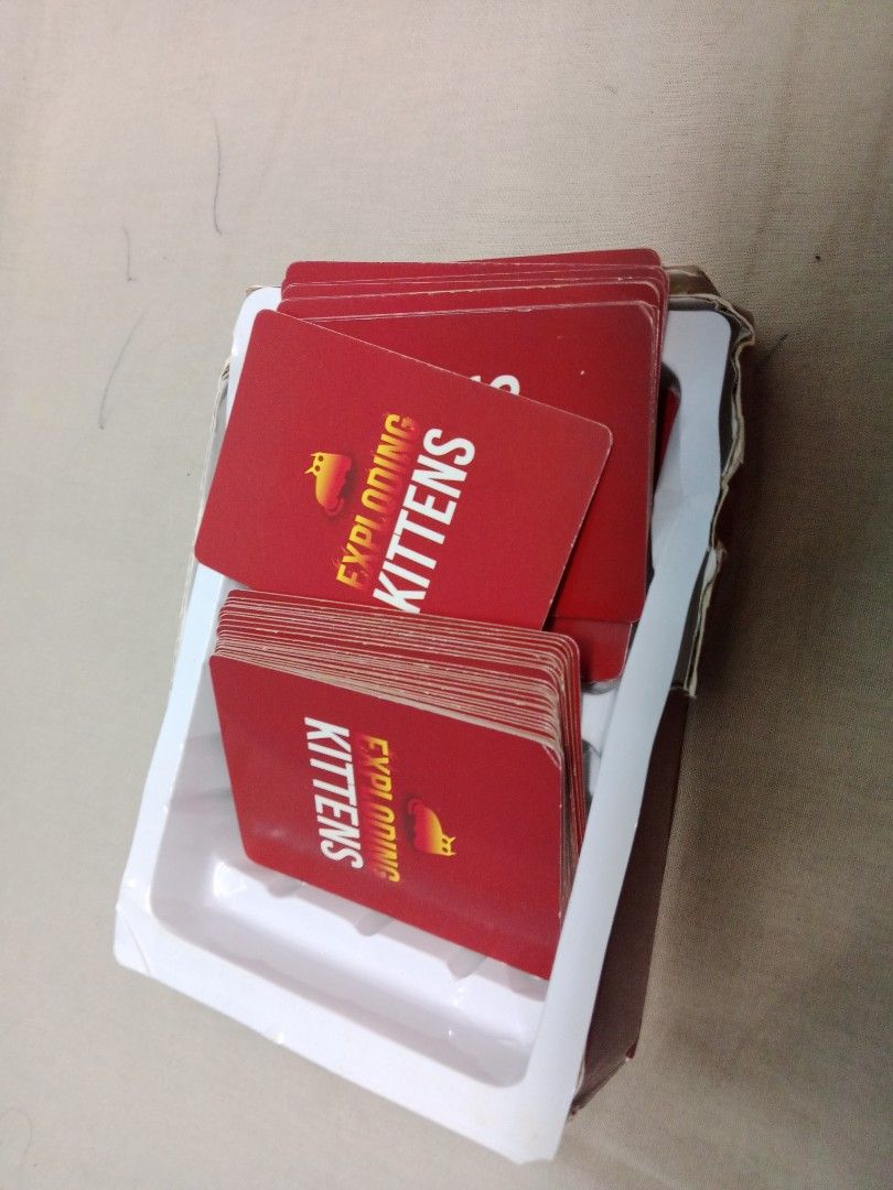 Exploding Kittens (Category: Toys & Games) located in Kuala Lumpur. Submitted by fattsup (Listing ID 1419309728, Image 2). Description: kad elok lagi semua cukup.
