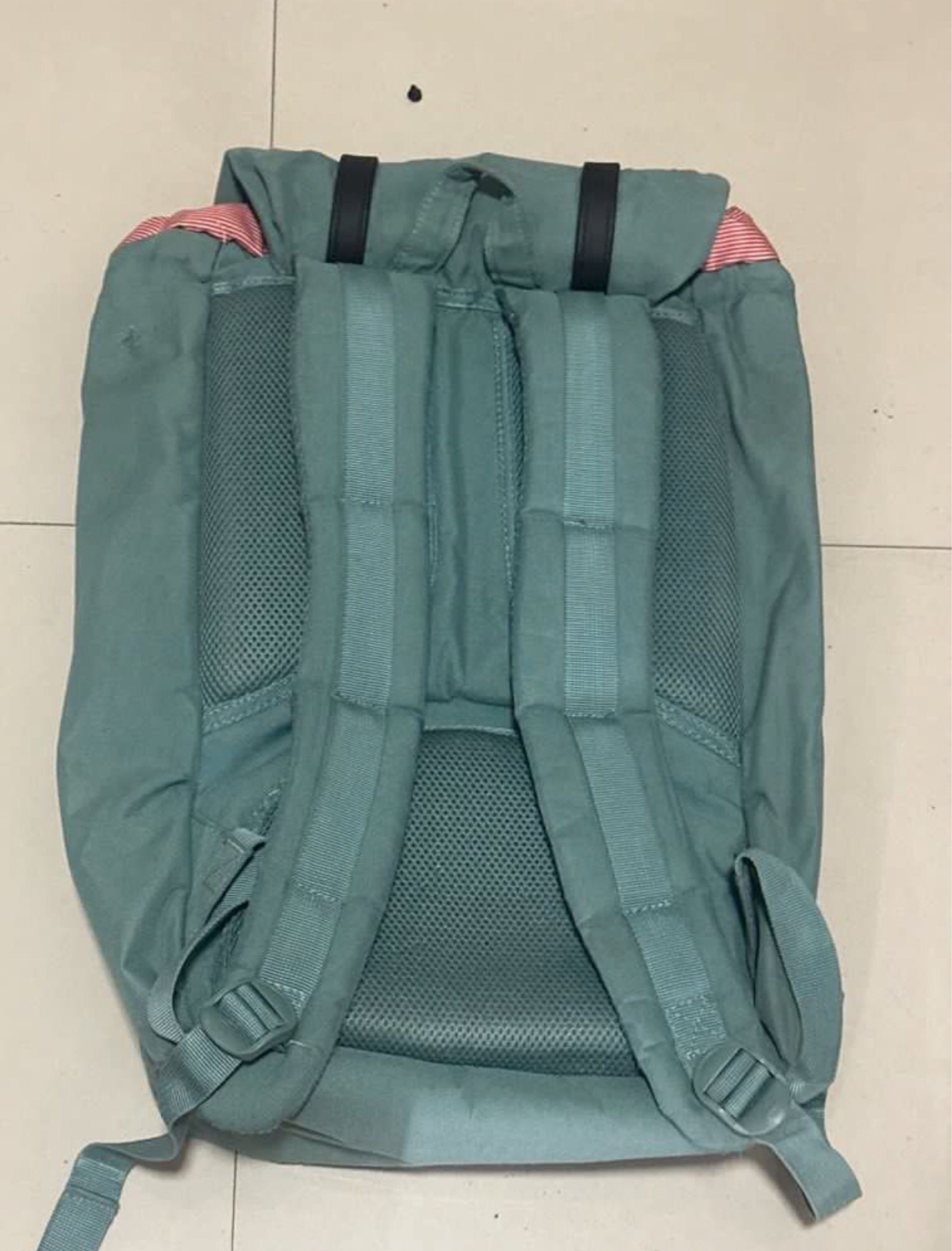 Herschel Supply Co. Backpack with Laptop Sleeve (Category: Backpacks) located in Manila. Submitted by wardrobepurgeph (Listing ID 1419337088, Image 3). Description: - Herschel Supply Co. backpack - Teal color (a bit dirty but can be cleaned) - Black straps and buckles in good condition - Red and white striped interior lining - WITH laptop sleeve that fits big laptops - Front pocket with zipper and hook inside - Adjustable shoulder straps - Hersch