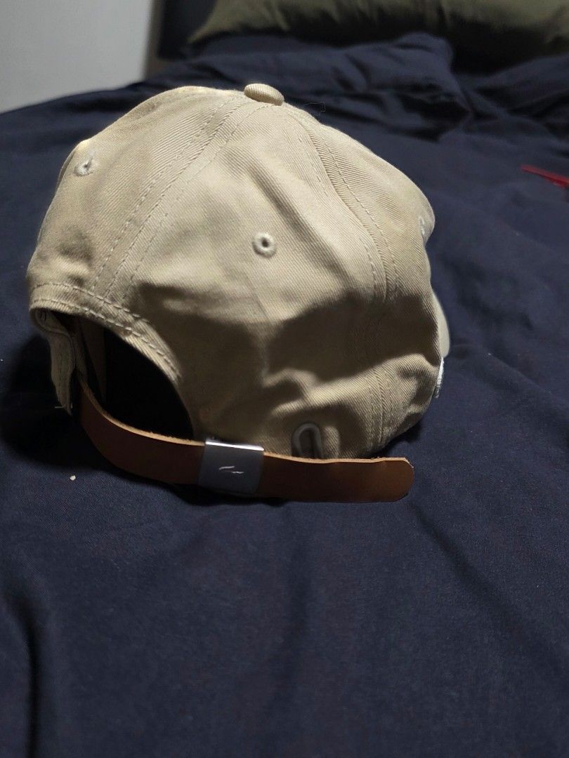 Lacoste Cap (Category: Caps & Hats) located in Quezon City. Submitted by yGGGG (Listing ID 1419242306, Image 3). Description: - Authentic Lacoste cap - Brandnew original - Neutral beige color - Iconic Lacoste crocodile logo - Adjustable leather strap - Includes original tags - One size fits all.