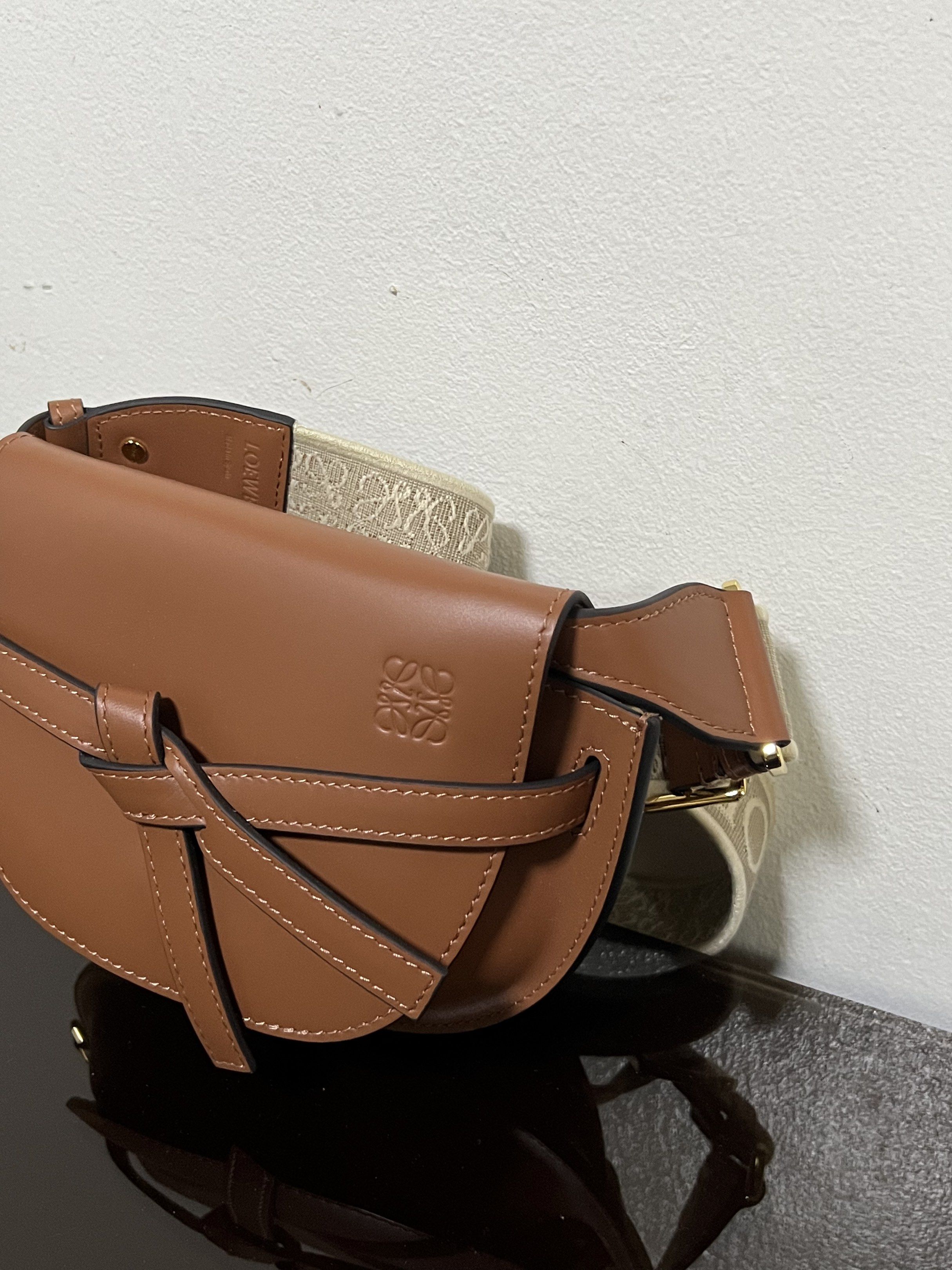 Loewe Gate Dual Mini Bag (Category: Luxury Bags & Wallets) located in Makati City. Submitted by vnz.flrls (Listing ID 1419350797, Image 2). Description: 🎀 8500 Php AUTH NOT GUARANTEED ᡣ𐭩 ྀིྀ Condition: Excellent Condition ᡣ𐭩 ྀིྀ Rating: 10/10 ᡣ𐭩 ྀིྀ Issues / flaws: none ᡣ𐭩 ྀིྀ Color: brown ᡣ𐭩 ྀིྀ Dimensions: 9x4x6 inches (LXWxH) ᡣ𐭩 ྀིྀ Inclusions: dust bag - with freebies 🫧 Note: please manage your expectations, might have signs of usage.