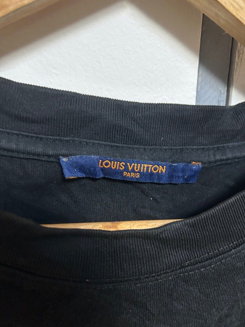 Louis Vuitton Black T-shirt (Category: Luxury Apparel) located in Jordan. Submitted by pareng_j0mar (Listing ID 1419330811, Image 3). Description: - Authentic Louis Vuitton t-shirt - Color: Black - Size: S - Made in Italy - Features embossed Louis Vuitton logo - Crew neck and short sleeves - Includes care instructions and size chart 21 by 28.