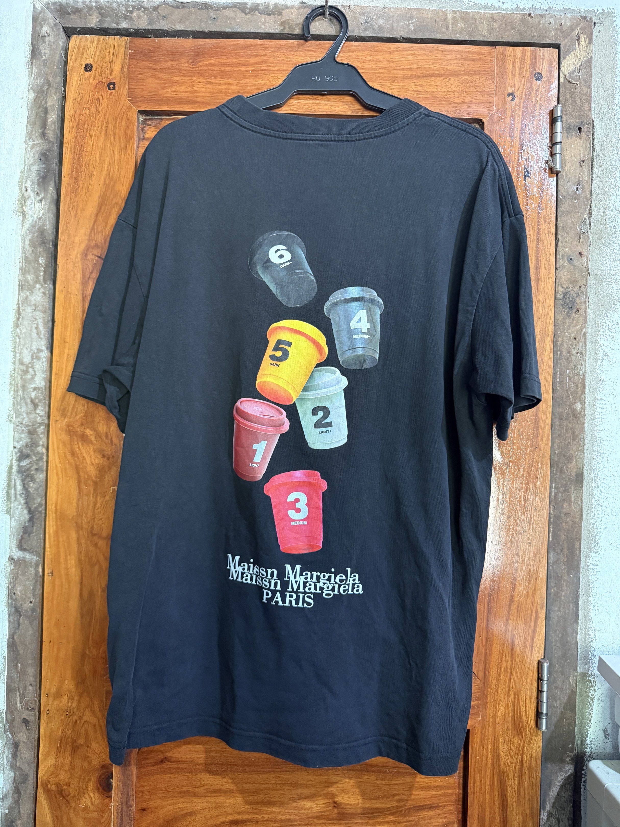 Maison Margiela 123456 Graphic Tee (Category: Tshirts & Polo Shirts ) located in Manila. Submitted by keepercollection (Listing ID 1419203968, Image 2). Description: - Maison Margiela T-shirt - Graphic print on front (numbers 123456) - Graphic print on back (colorful cups, numbers, Maison Margiela logo) - Size and brand tag included - Made in Italy.