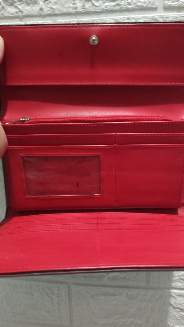 Maldita Black and Red Wallet (Category: Wallets & Card holders) located in Cavite. Submitted by nesstuffandeverything (Listing ID 1419195737, Image 1). Description: - Black Maldita wallet - Red interior - Multiple card slots - Clear ID window - Zippered compartment - Snap closure.