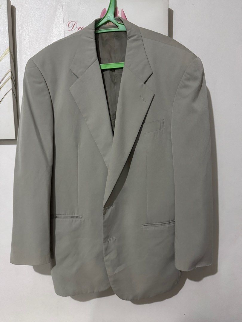 Men’s Blazer/Suit (Category: Coats, Jackets and Outerwear) located in Quezon City. Submitted by kimvmdr (Listing ID 1419293704, Image 1). Description: • Type: Single-breasted blazer • Color: Light gray / stone gray • Lapel: Notch lapel • Closure: Two-button front • Pockets: Chest pocket + two side pockets • Condition: Pre-owned, good condition (no visible stains or tears).