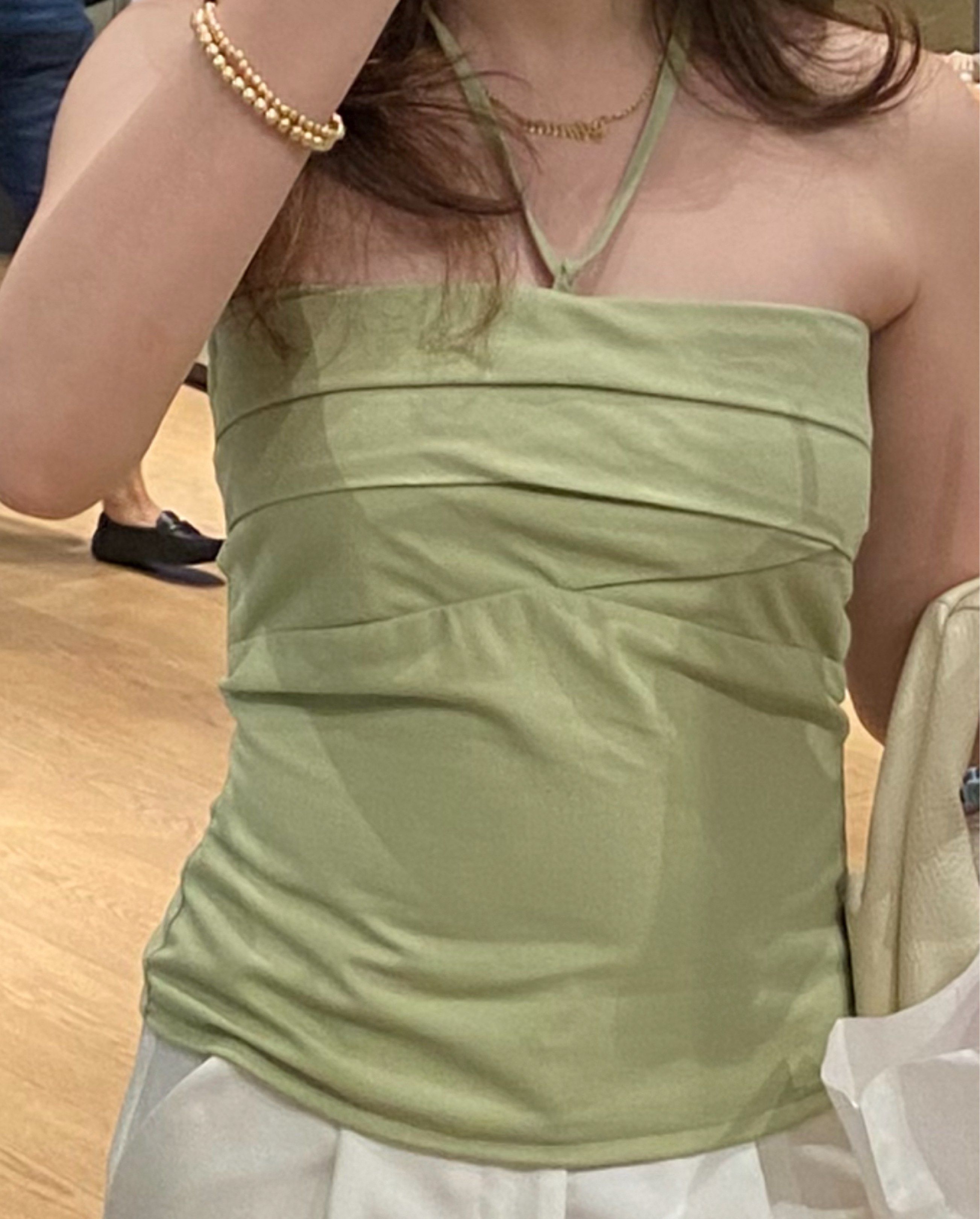 Miu the Label Mint Green Tiki Top (Category: Sleeveless) located in Paranaque City. Submitted by impulsiveasf (Listing ID 1419311663, Image 2). Description: - I want a diff color MY DOG KINDA CHEW ON THE THING TO TIE THE TOP 😭.