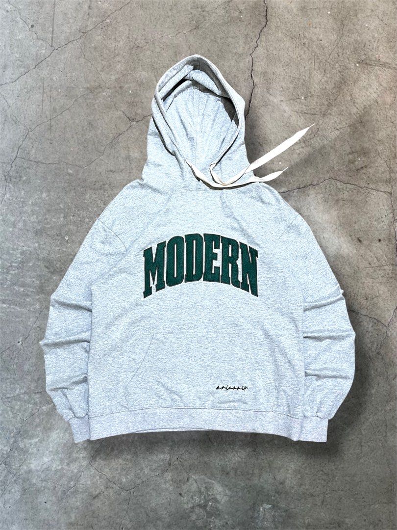 Modern Grey Hoodie (Category: Hoodies) located in Surigao. Submitted by vbimo (Listing ID 1418853214, Image 1). Description: - Gray hoodie - Dimes 23 x 27 / Large - Hood with drawstring - Front pocket - Embroidered sleeve detail - Soft material.