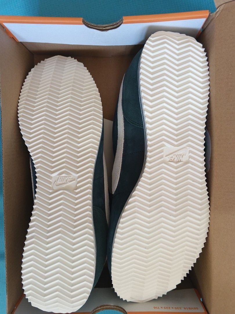 Nike Cortez PRM Seaweed/Sail (Category: Sneakers) located in Bacoor. Submitted by nmcave (Listing ID 1419241776, Image 3). Description: - Nike Cortez PRM - Colorway: Seaweed/Sail - Size: 13 - Features: Dark blue green / seaweed suede upper, white swoosh and midsole - Condition: Brand new with original tags - Includes: Original box - Made in Indonesia.