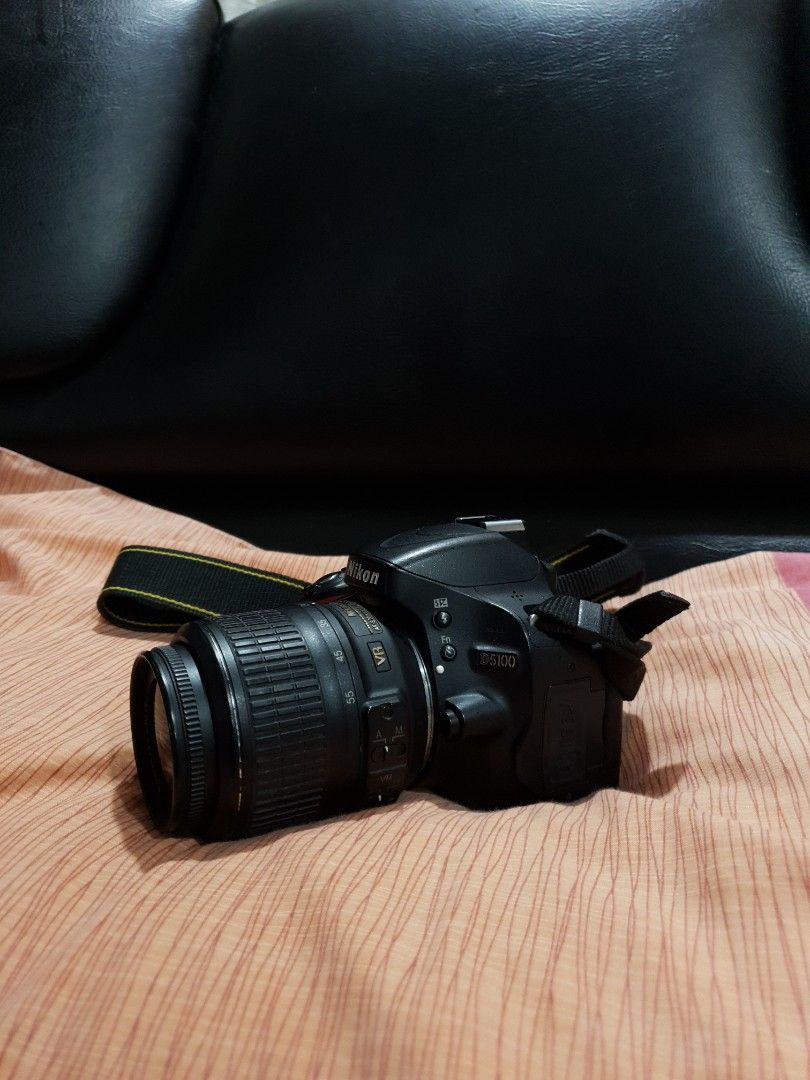 Nikon D5100 | DSLR Camera with Lens (Category: Cameras) located in Bacoor. Submitted by sandrin3 (Listing ID 1419380347, Image 2). Description: - Nikon DSLR camera - Includes 18-55mm lens - Comes with camera strap and camera bag - Black camera body - In good working condition.