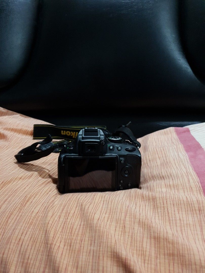 Nikon D5100 | DSLR Camera with Lens (Category: Cameras) located in Bacoor. Submitted by sandrin3 (Listing ID 1419380347, Image 3). Description: - Nikon DSLR camera - Includes 18-55mm lens - Comes with camera strap and camera bag - Black camera body - In good working condition.