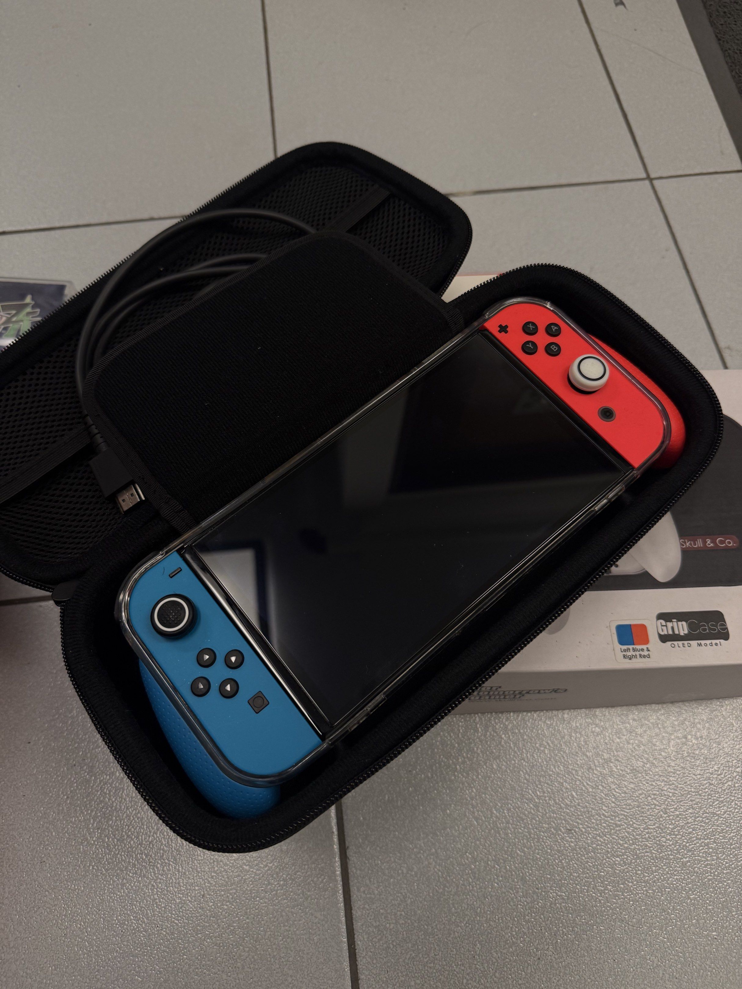Nintendo Switch OLED Console Bundle (Category: Nintendo) located in Caloocan City. Submitted by greatwdemi (Listing ID 1419317993, Image 3). Description: Nintendo Switch OLED Bought November 2025 Sobrang bago pa walang gasgas Complete Inclusion Freebies Hogwarts Legacy Pokemon ZA Bayonetta 3 Case Covers Grips RFS: Changed priorities haha PM for more details.