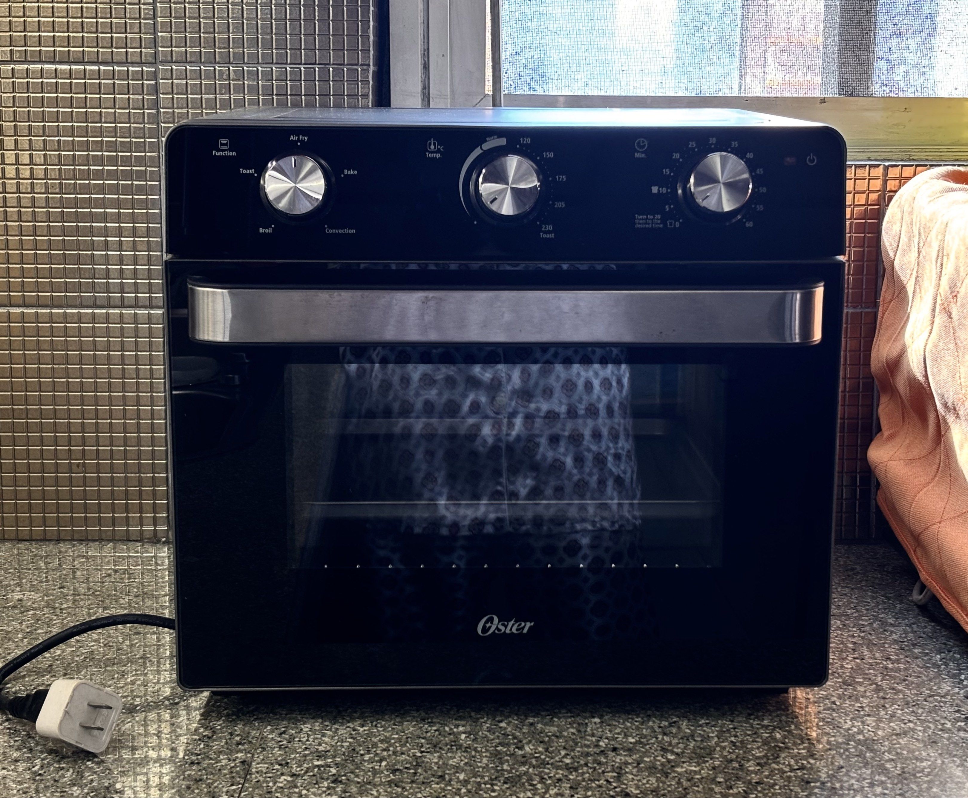 Oster Oven with Airfryer (Category: Fryers) located in Caloocan City. Submitted by pastalovers (Listing ID 1419215046, Image 1). Description: -Only used as an airfryer -With baking tray, mesh air fryer basket, removable crumb tray, and manual -No box -Haven't tried the broil and toast mode Flaws: Bake and Convection Bake mode not working kaya never namin nagamit for baking. Hindi umiinit sa loob. You can have it checked in authorized stores in th