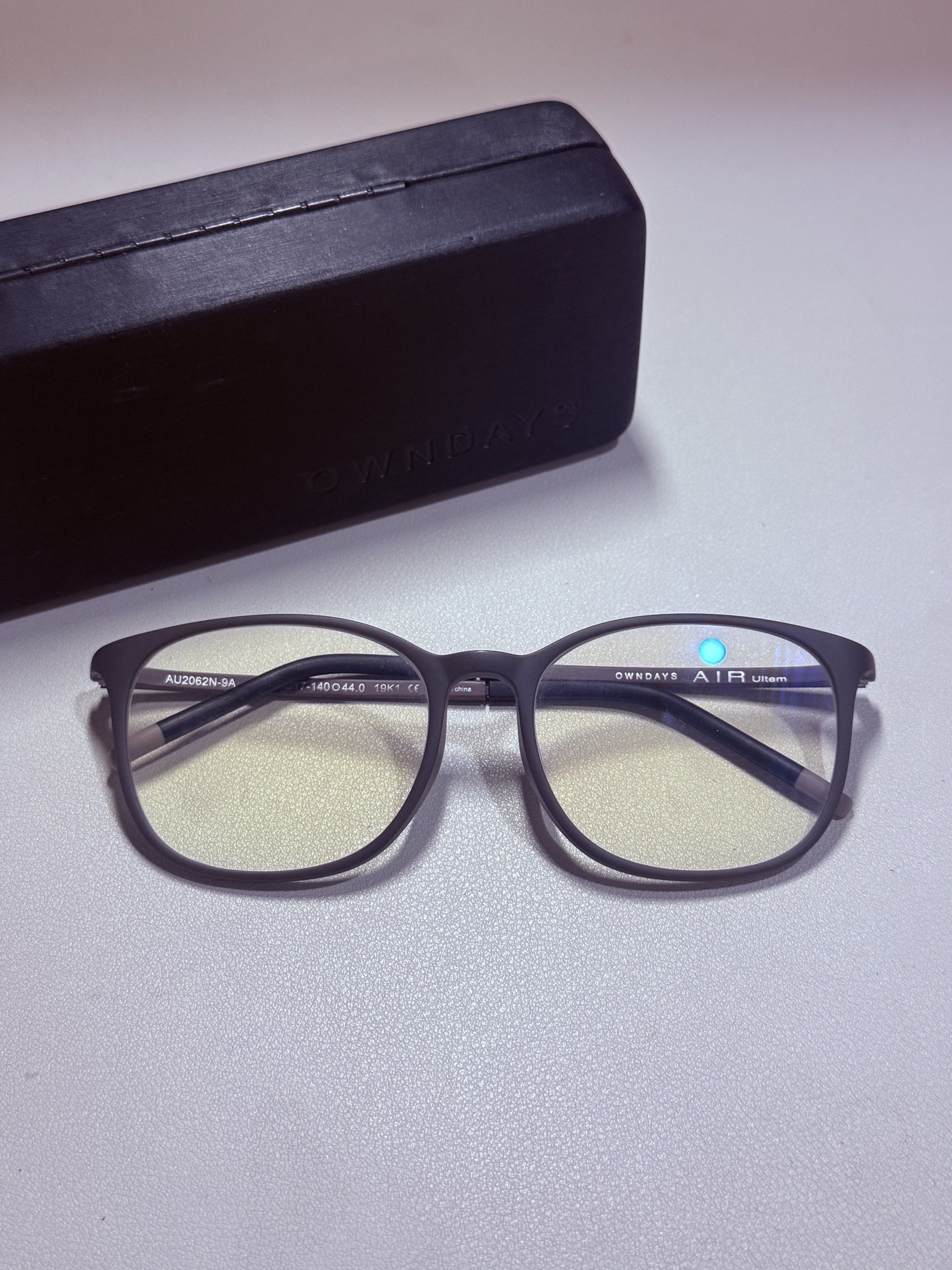 OWNDAYS AIR Ultem Eyeglasses (Category: Sunglasses & Eyewear) located in San Juan City. Submitted by shoprinat (Listing ID 1419361035, Image 1). Description: - OWNDAYS AIR Ultem eyeglasses - Dark rectangular frame - Blue light filter - Model: AU2062N-9A - Frame size: 140 C 44 18 - Includes original case.