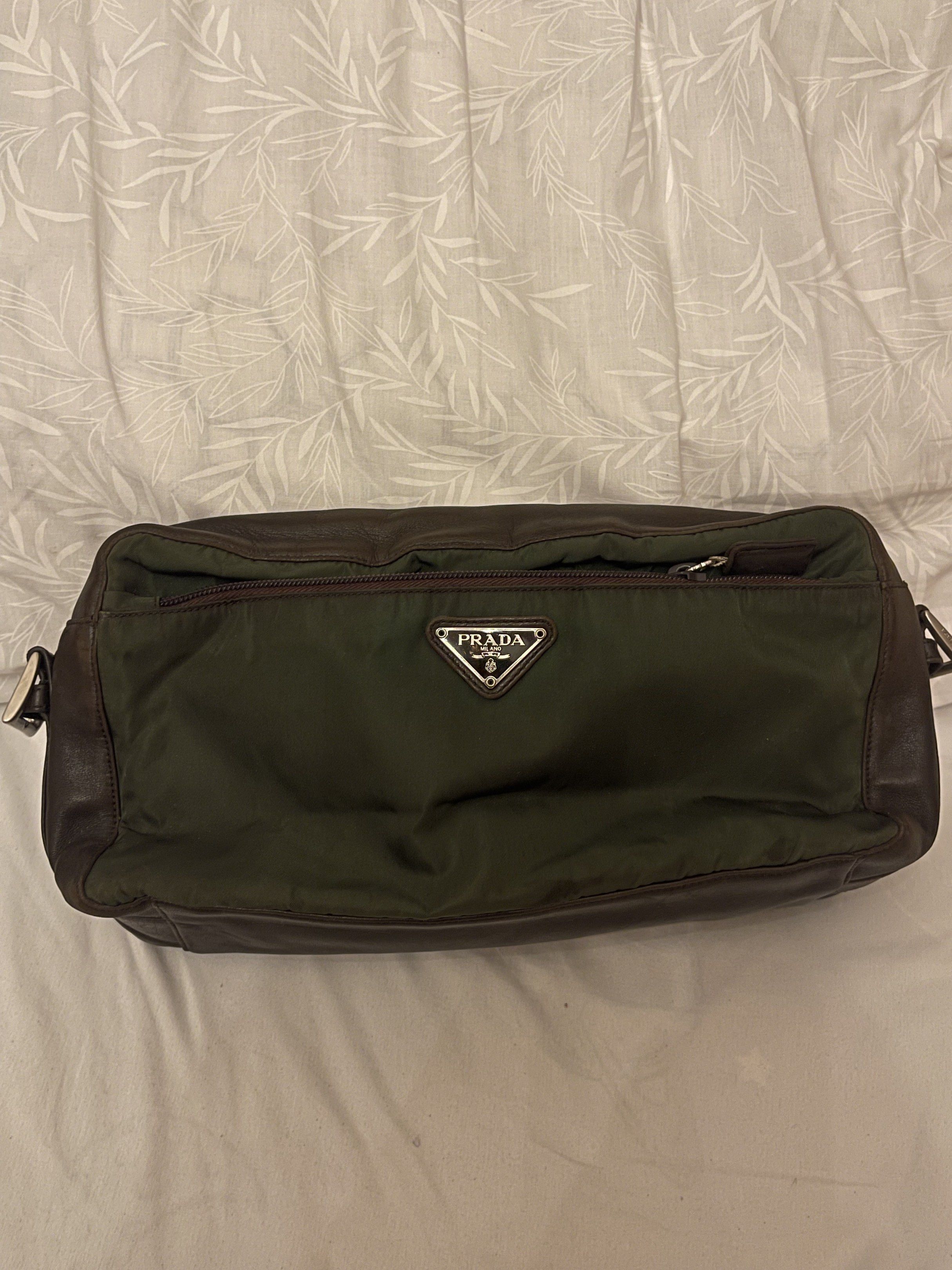 Prada Crossbody Bag/pouch (Category: Luxury Bags & Wallets) located in Marilao. Submitted by wardrovearchives (Listing ID 1419362189, Image 2). Description: Authentic Prada Milano nylon & leather bag • Classic triangle logo • Made in Italy hardware • Durable Prada tessuto nylon • Vintage piece with natural signs of age • Spacious, lightweight, and timeless, belt strap not inlcuded This is a pre-loved vintage item — expect gentle wear that adds ch