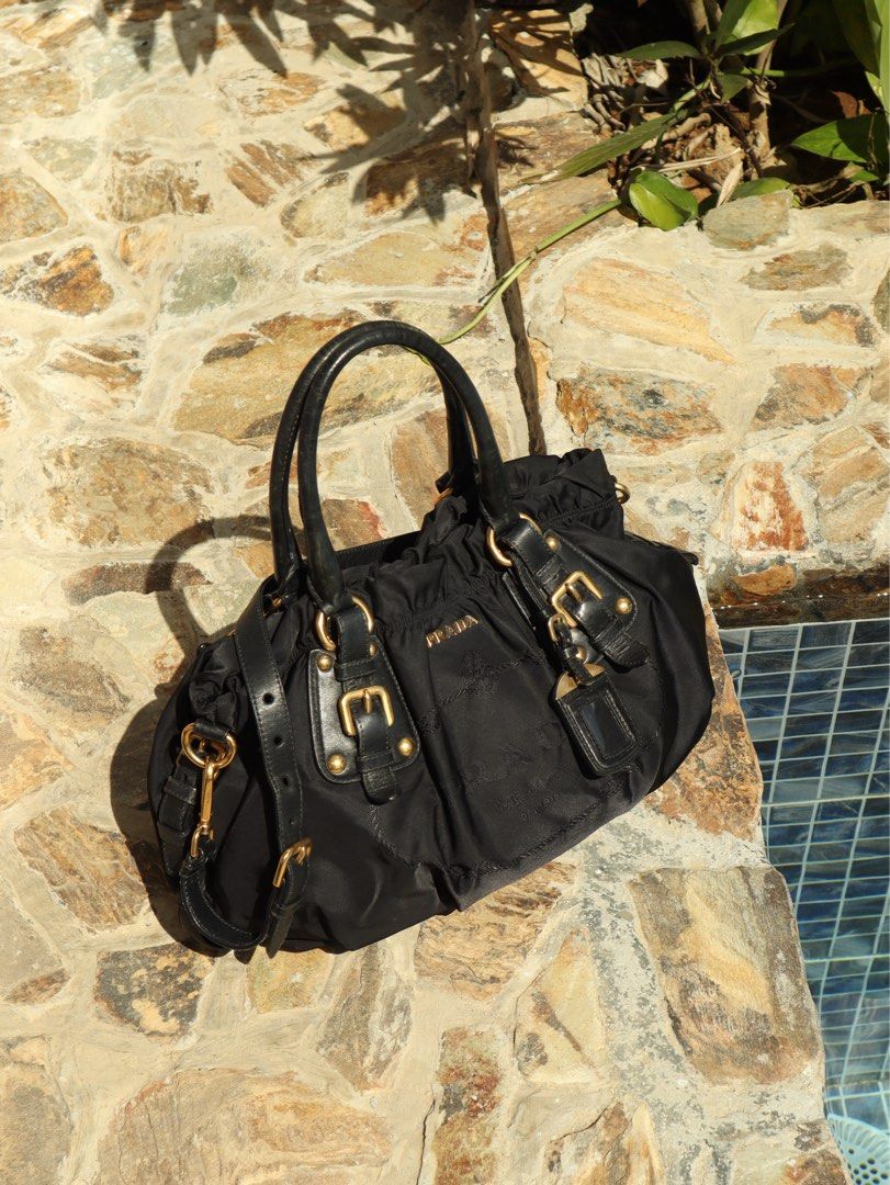 Prada Nylon Jacquard Two-Way Bag (Category: Luxury Bags & Wallets) located in San Fernando. Submitted by diorboi_ (Listing ID 1419232258, Image 2). Description: Prada Nylon Jacquard Two-Way Bag 🖤 - 💯 AUTHENTIC! - with entrupy certificate, auth cards & DB - no foul smell, stains, etc - comes with strap - minimal signs of use on leather handles, but still fine in person - so chic 💃🏻 🏷️ 25,000 - NEGOTIABLE no barat!.