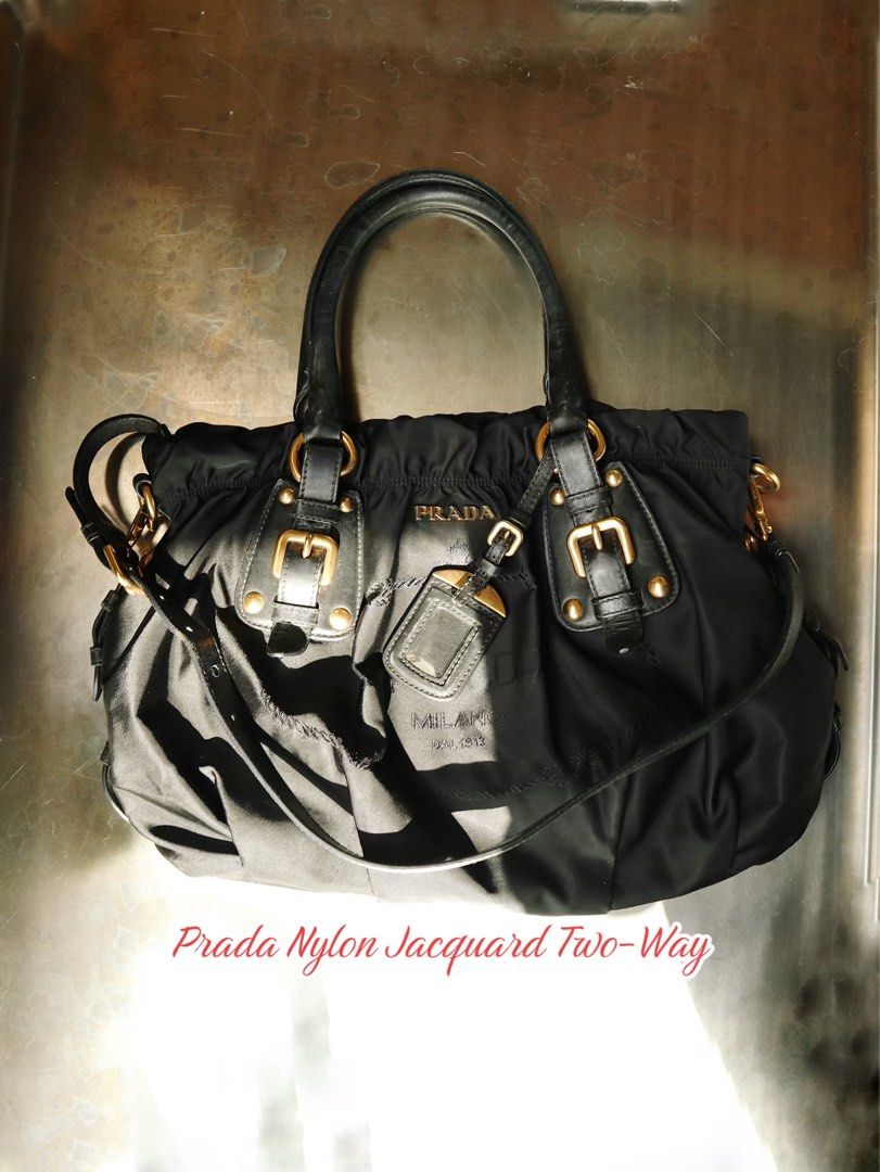 Prada Nylon Jacquard Two-Way Bag (Category: Luxury Bags & Wallets) located in San Fernando. Submitted by diorboi_ (Listing ID 1419232258, Image 1). Description: Prada Nylon Jacquard Two-Way Bag 🖤 - 💯 AUTHENTIC! - with entrupy certificate, auth cards & DB - no foul smell, stains, etc - comes with strap - minimal signs of use on leather handles, but still fine in person - so chic 💃🏻 🏷️ 25,000 - NEGOTIABLE no barat!.