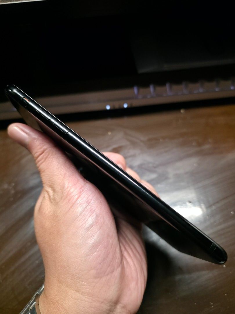 Rare iPhone 7 Plus Jet Black 128GB (Category: iPhone 7 Series) located in Quezon City. Submitted by rmel13 (Listing ID 1419356761, Image 2). Description: For sale only iPhone 7 Plus Jet Black Color This glossy Jet Black color is exclusive only to the 128GB and 256GB variants. Model is from China where NFC can be turned off in settings which is not available in other models. Battery Health is 70% There is a hairline crack on the lower left and a s