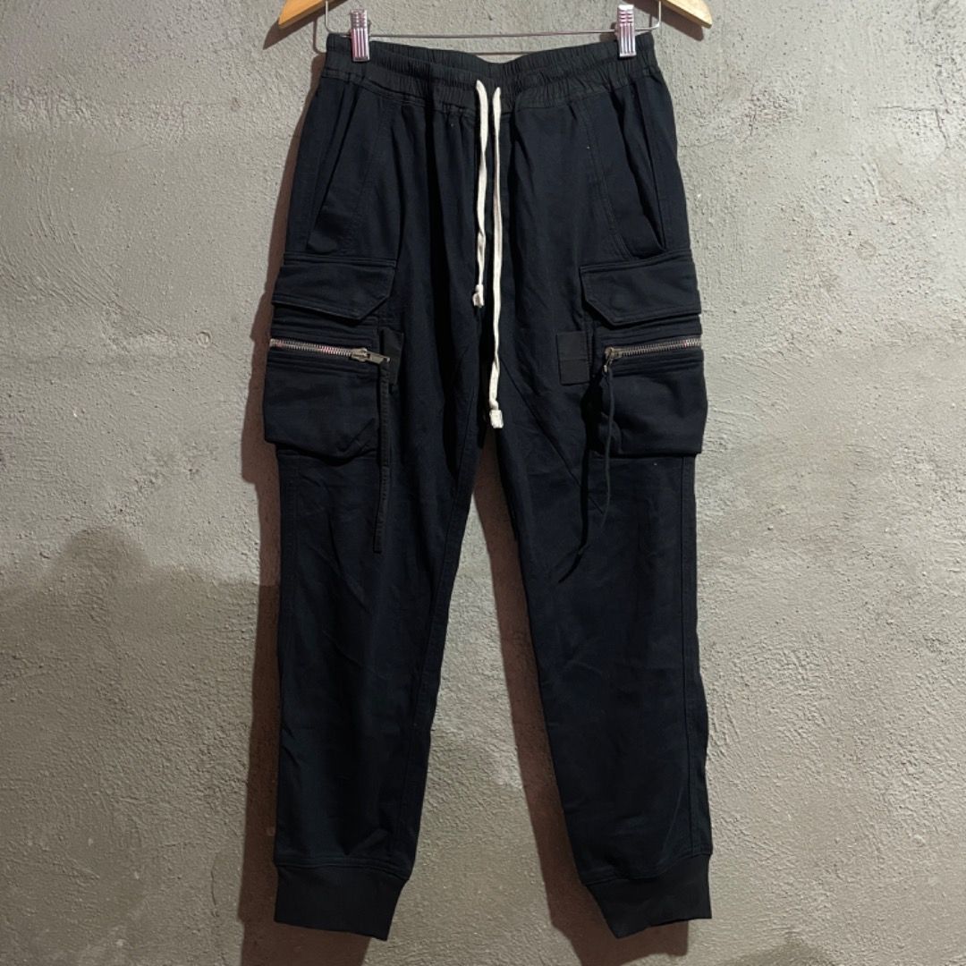 Rick Owens Cargo Jogger Pants (Category: Joggers) located in Bacolod City. Submitted by cast.archives (Listing ID 1419369653, Image 1). Description: Rick Owens Cargo Jogger Pants Waist: 28” - 32” Length: 36” Inseam: 26” Condition: Excellent Flaw: None.